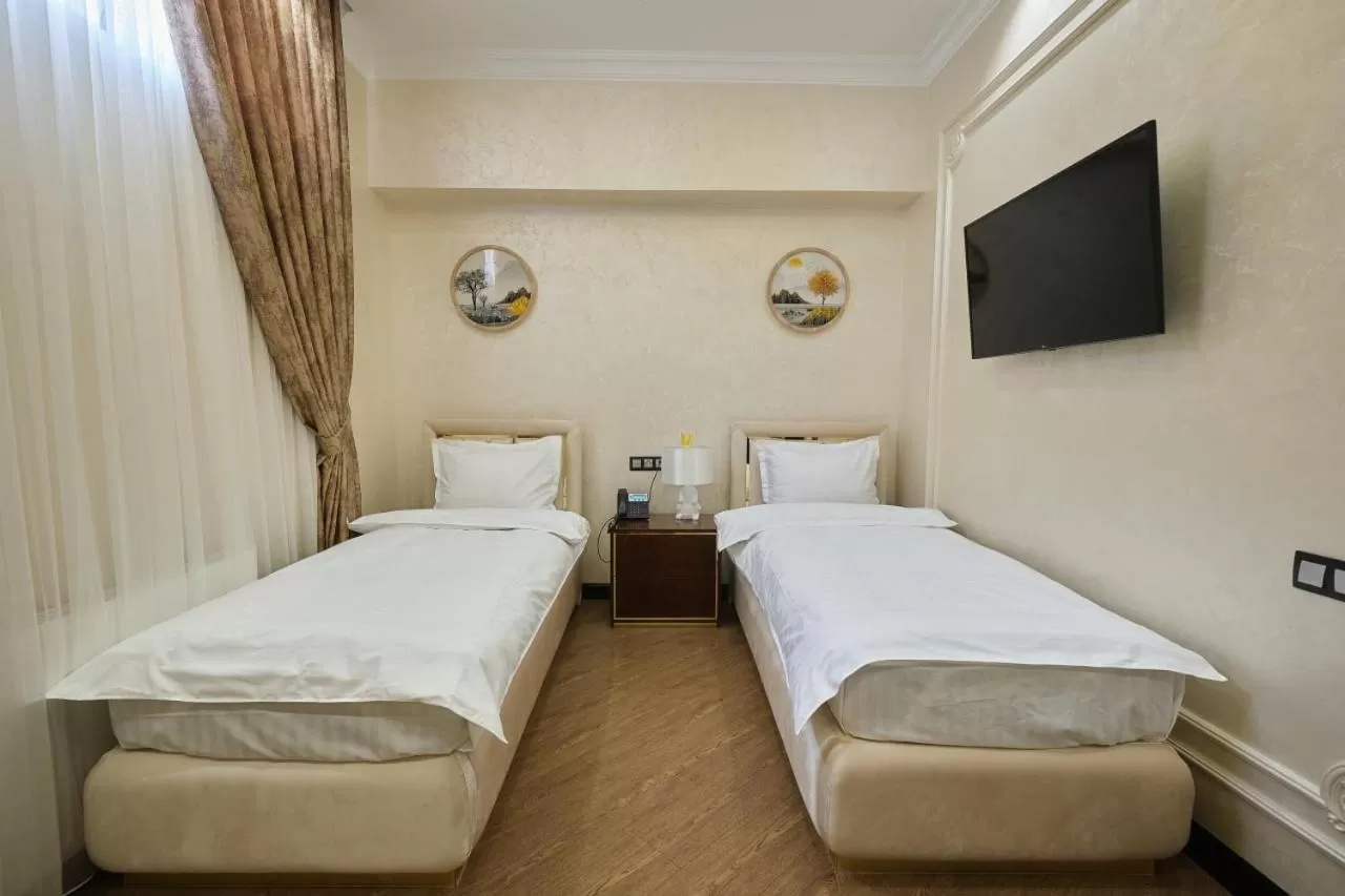 Bed in East Star Hotel