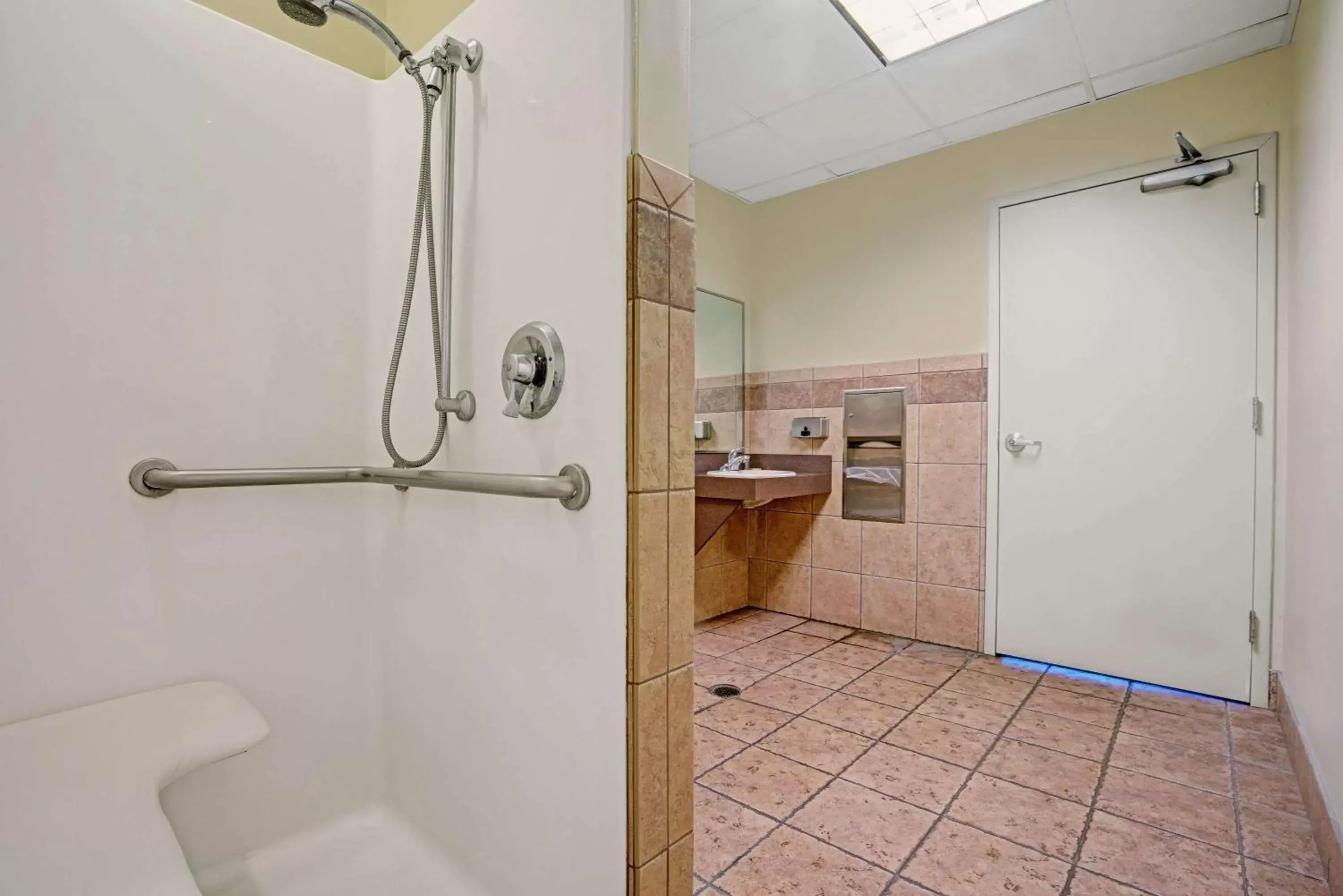 Bathroom in Super 8 by Wyndham Rogers Minnesota