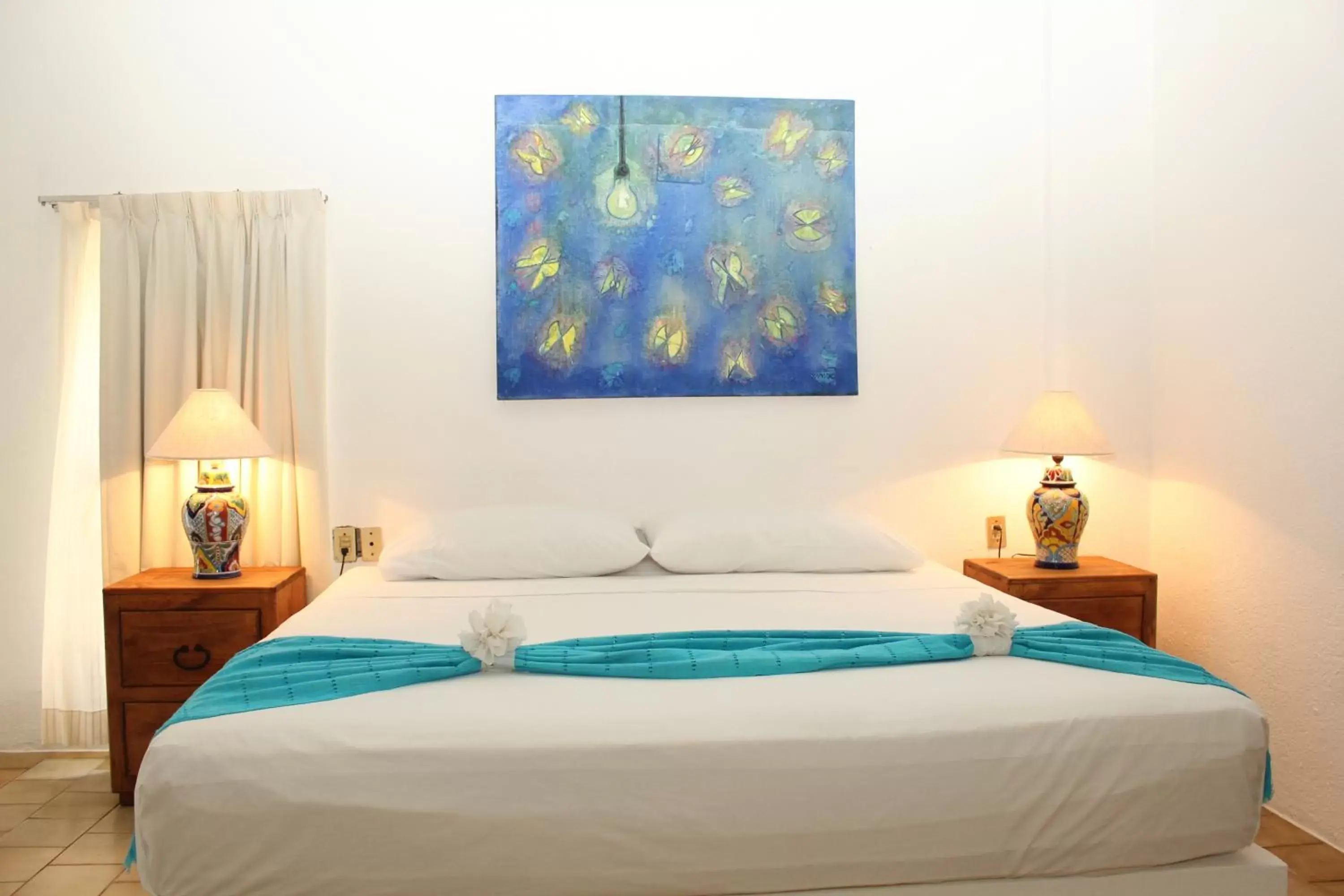 Bed in Emperador Vallarta Beachfront Hotel and Suites Bed in Emperador Vallarta Beachfront Hotel and Suites