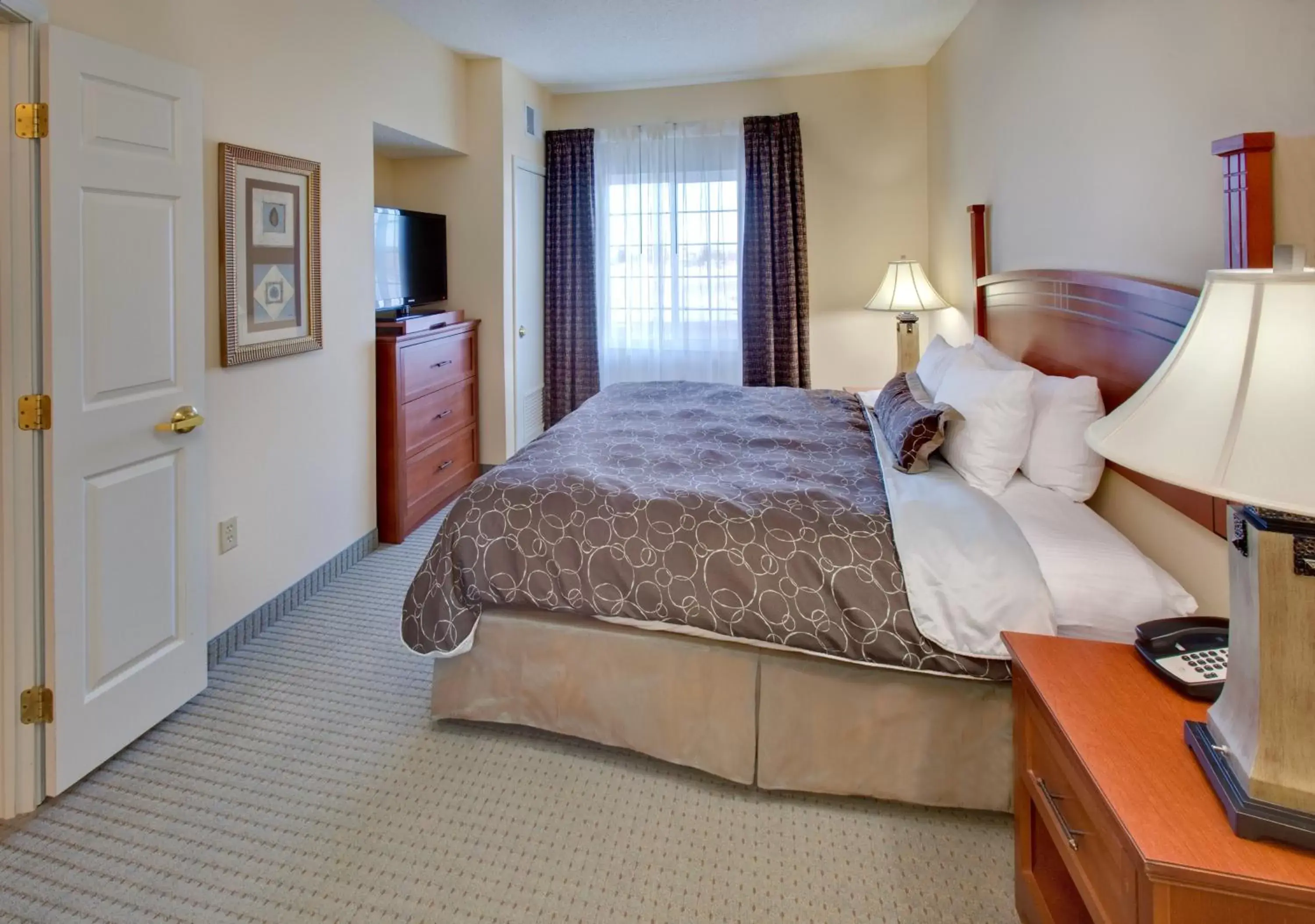 Bed in Staybridge Suites Fargo, an IHG Hotel