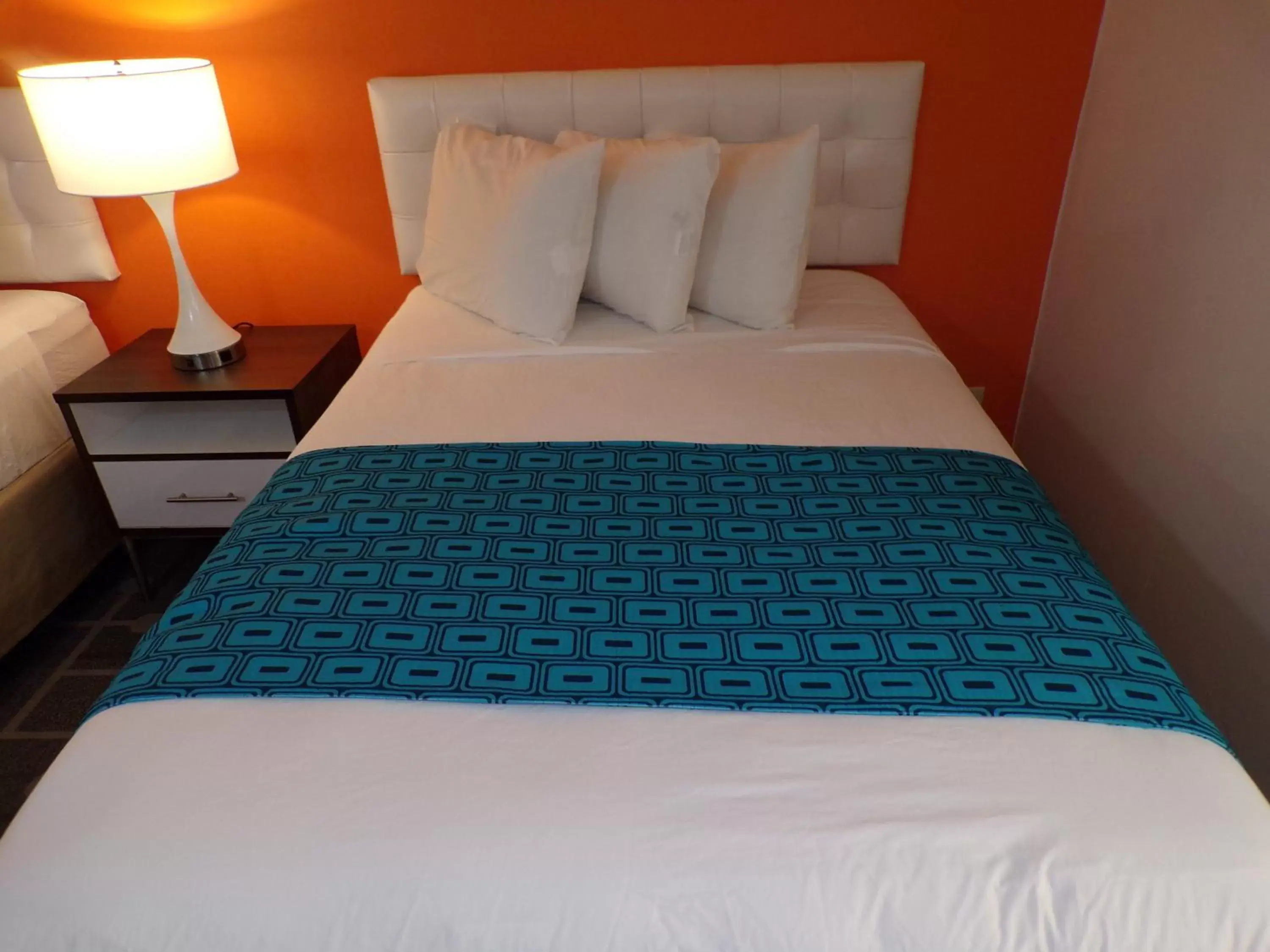 Bed in Dover Inn and Suites