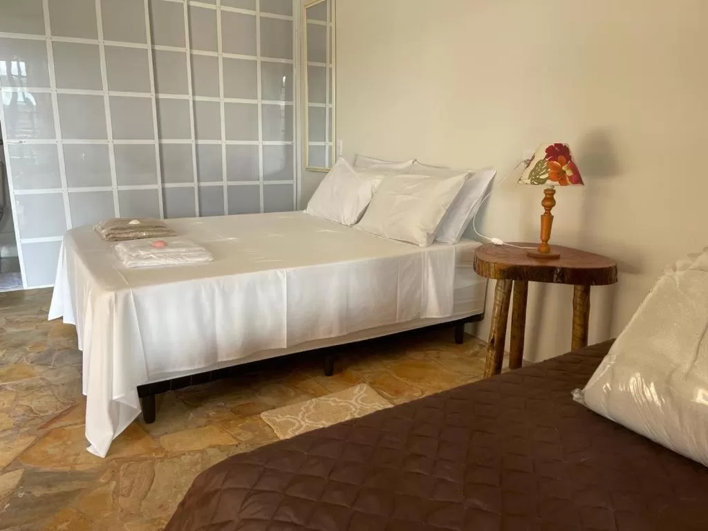 Bed in Pousada R.N.C. Nosso Paraíso