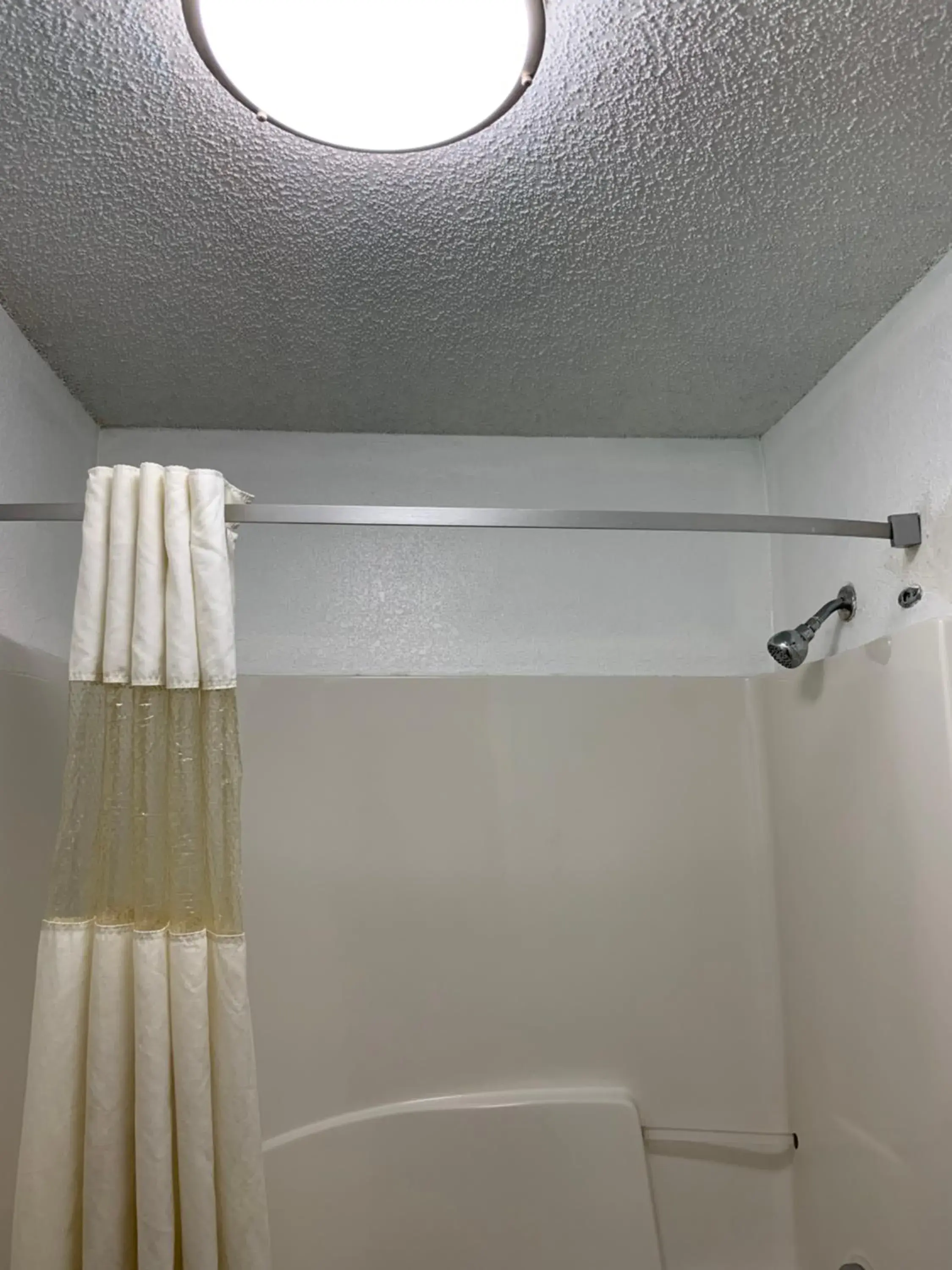 Shower, Bathroom in Travelodge Suites by Wyndham MacClenny