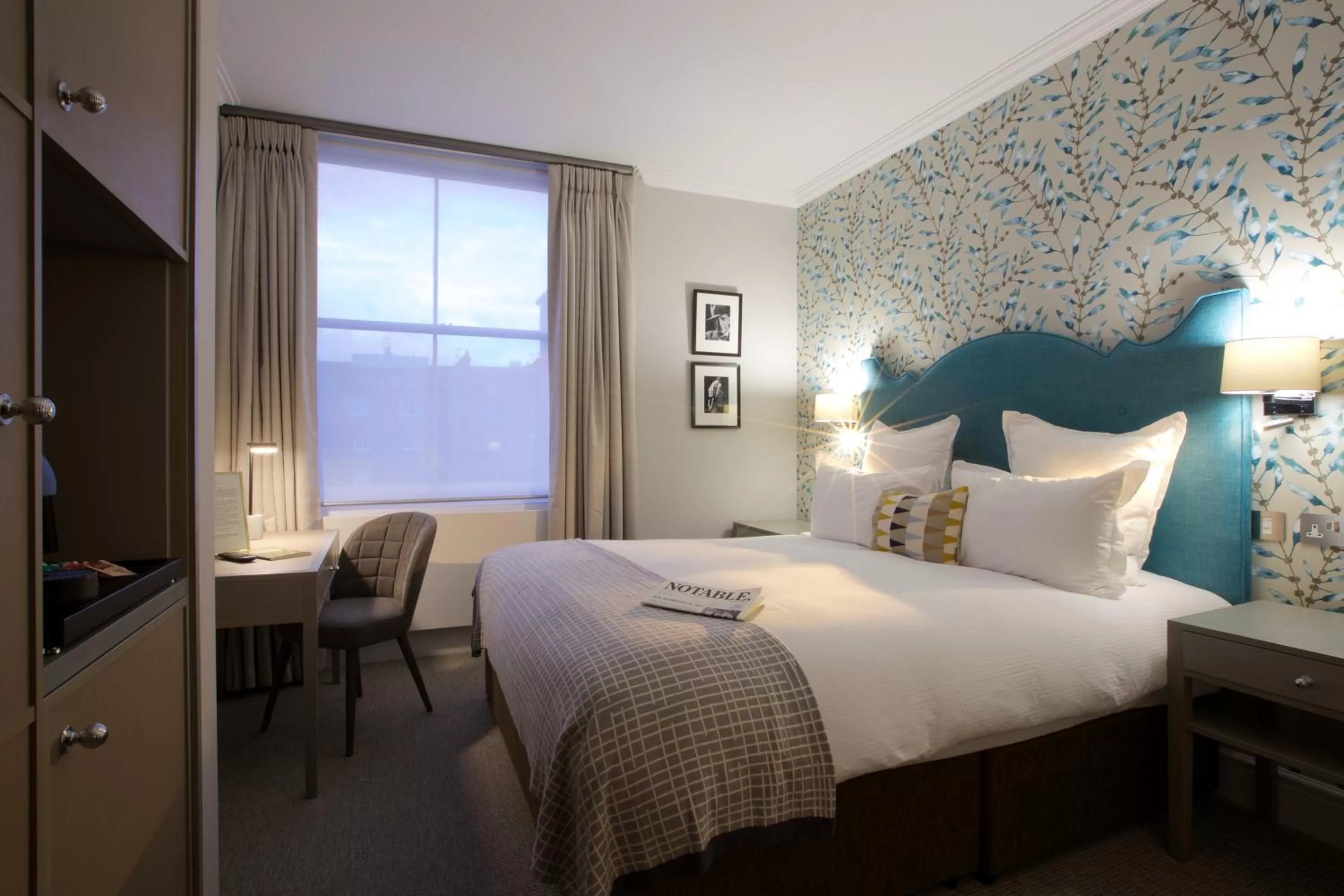 Bed in 54 Queen's Gate Hotel