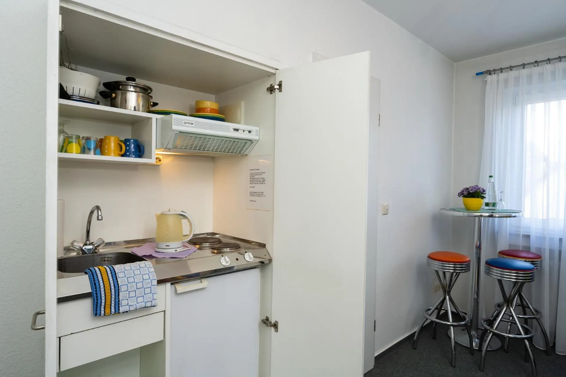 Kitchen or kitchenette in Ambient Hotel am Europakanal