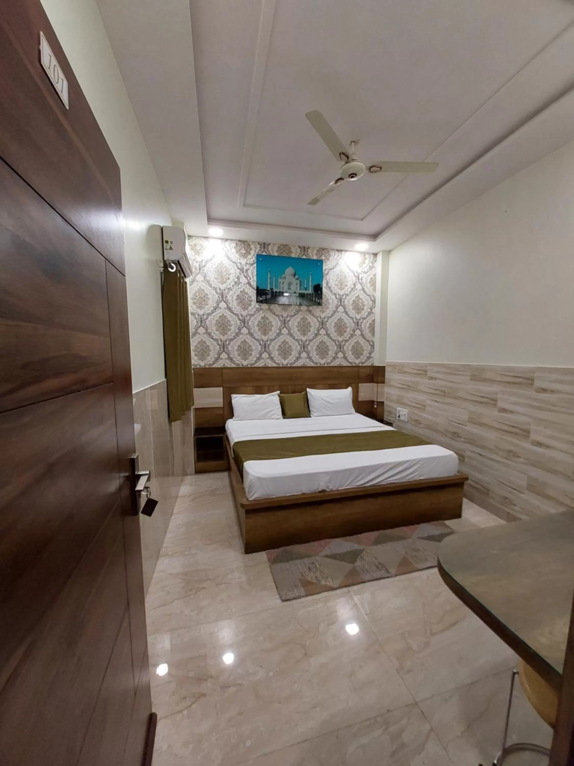 Bed in Taj Nice Point Manage by Taj Sunrise Group