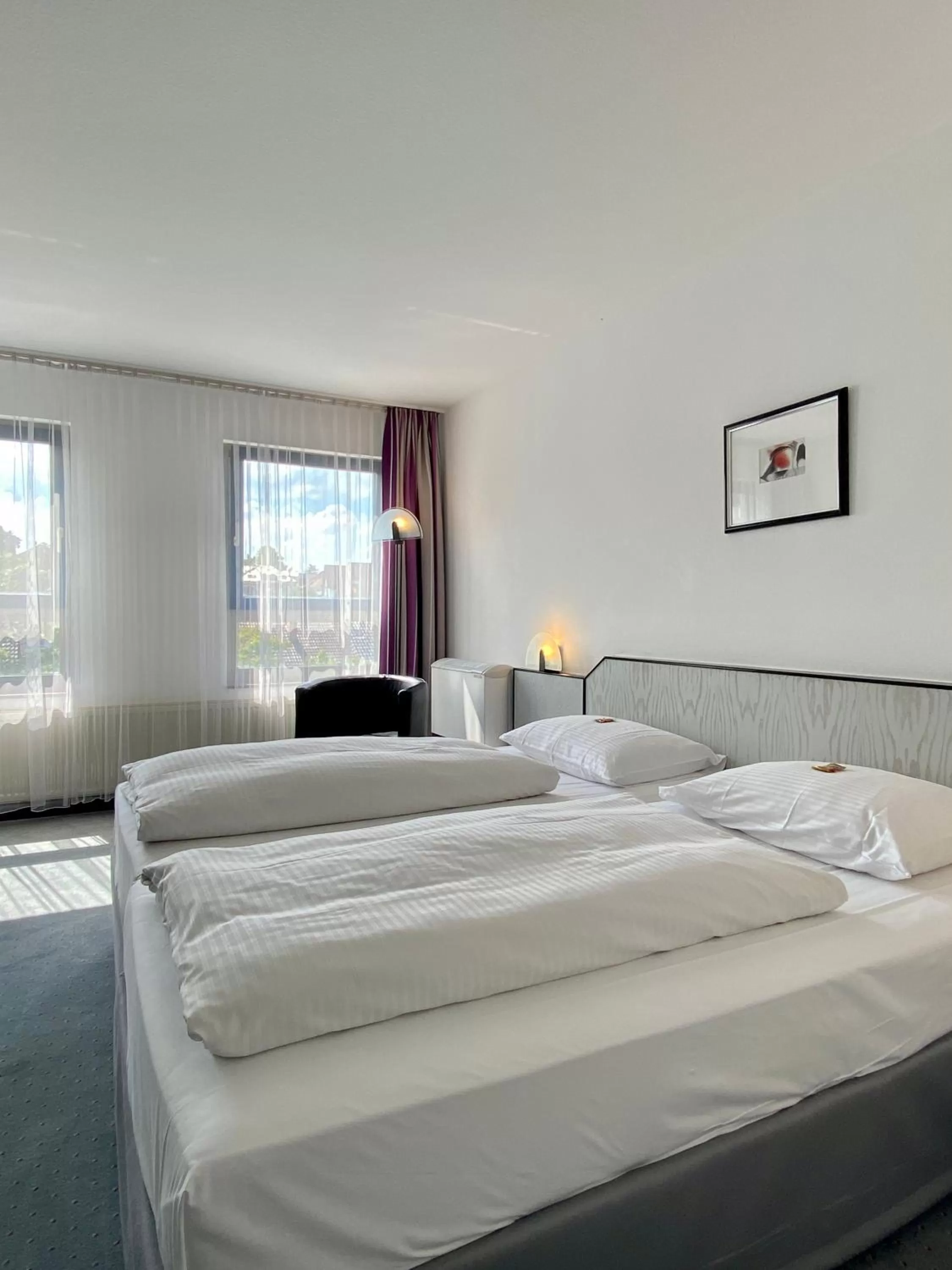 Photo of the whole room, Bed in City Hotel Fortuna Reutlingen