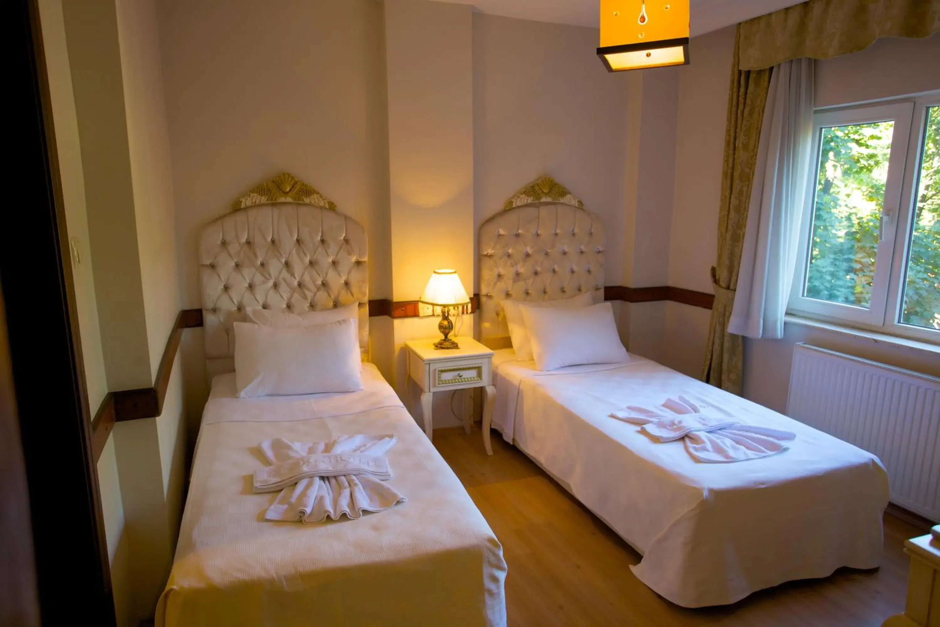 Bedroom, Bed in Adora Hotel