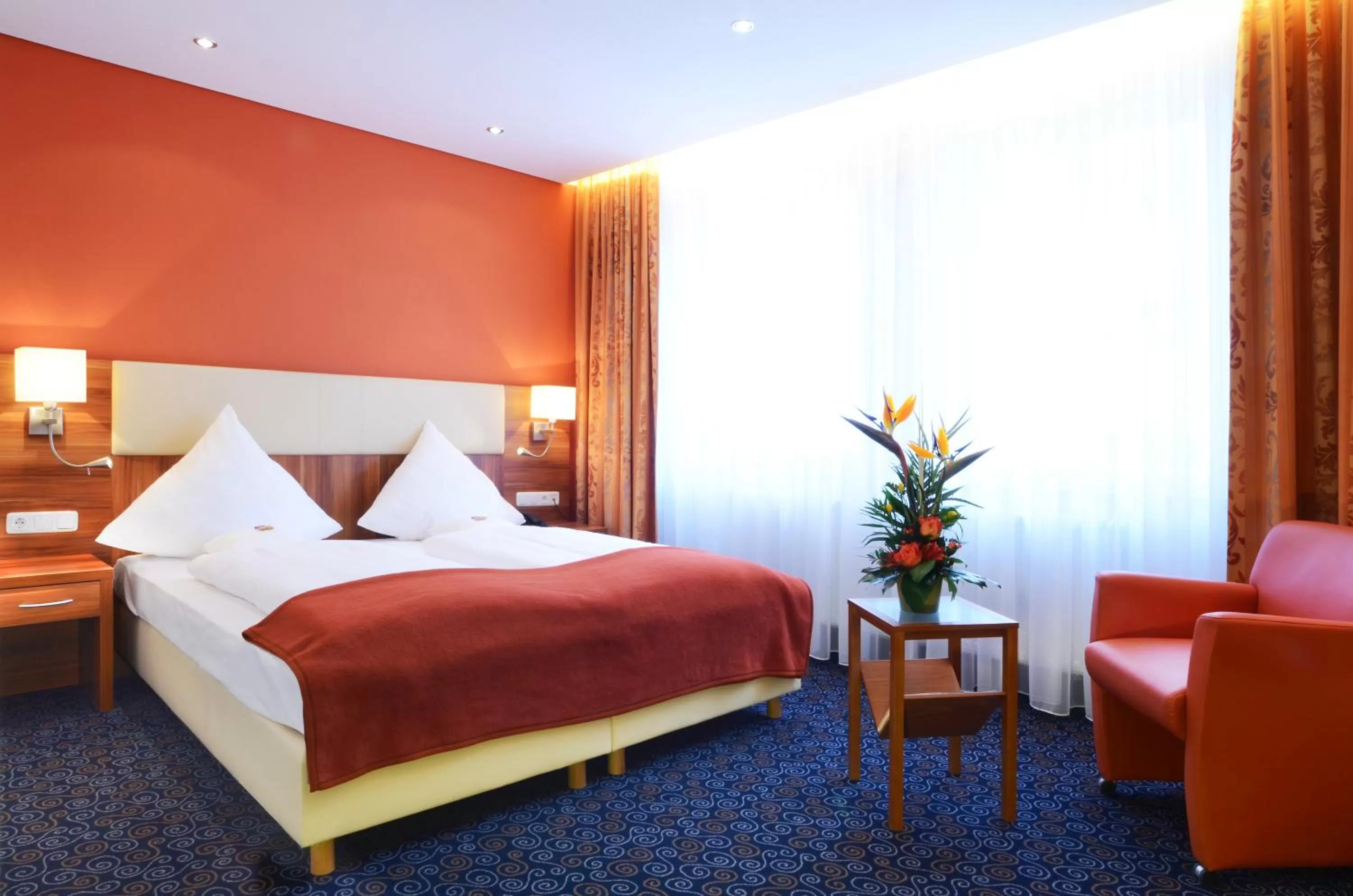 Photo of the whole room, Bed in Ringhotel Loew's Merkur