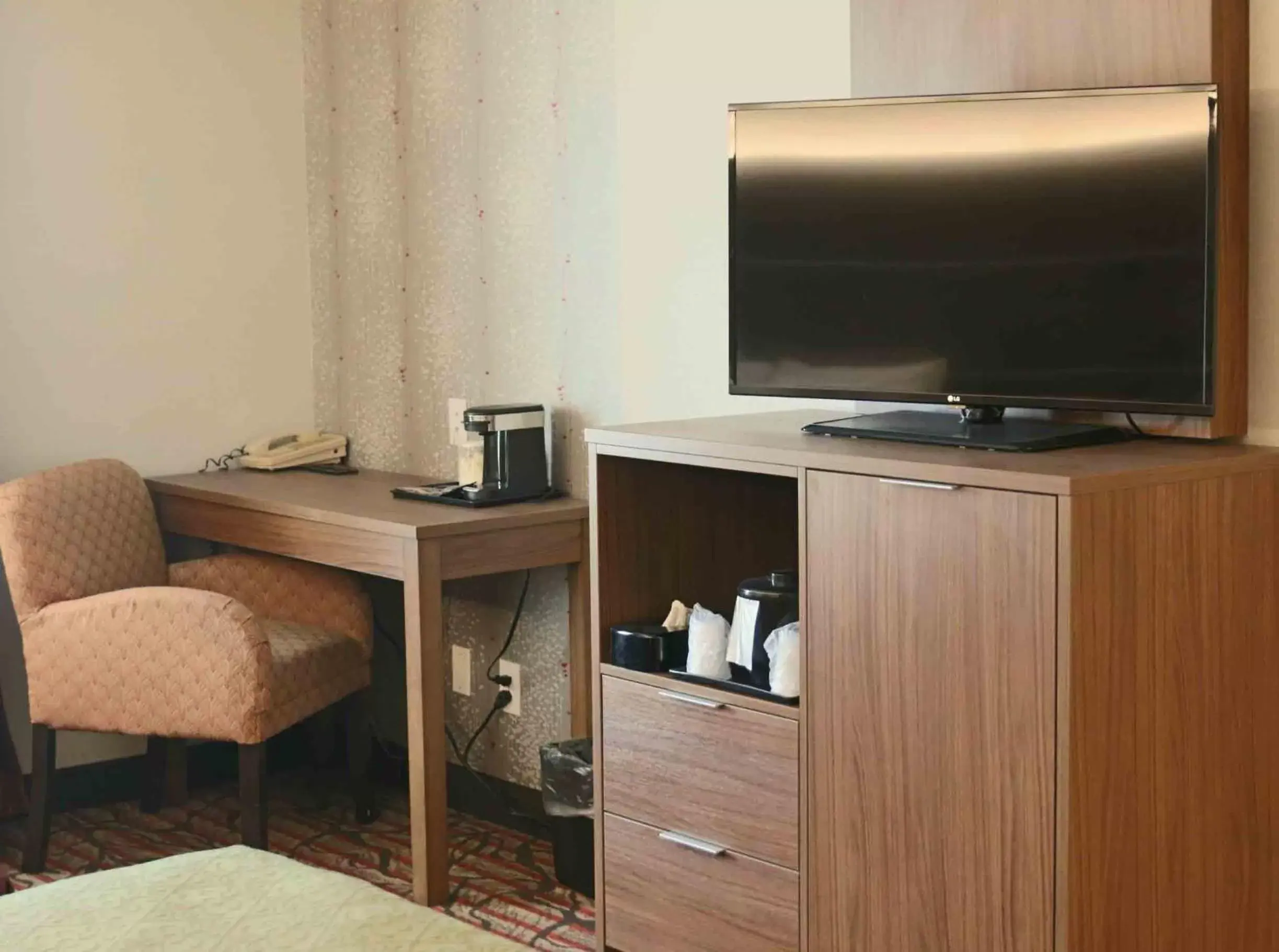 Photo of the whole room, TV/Entertainment Center in Kalika Hotel