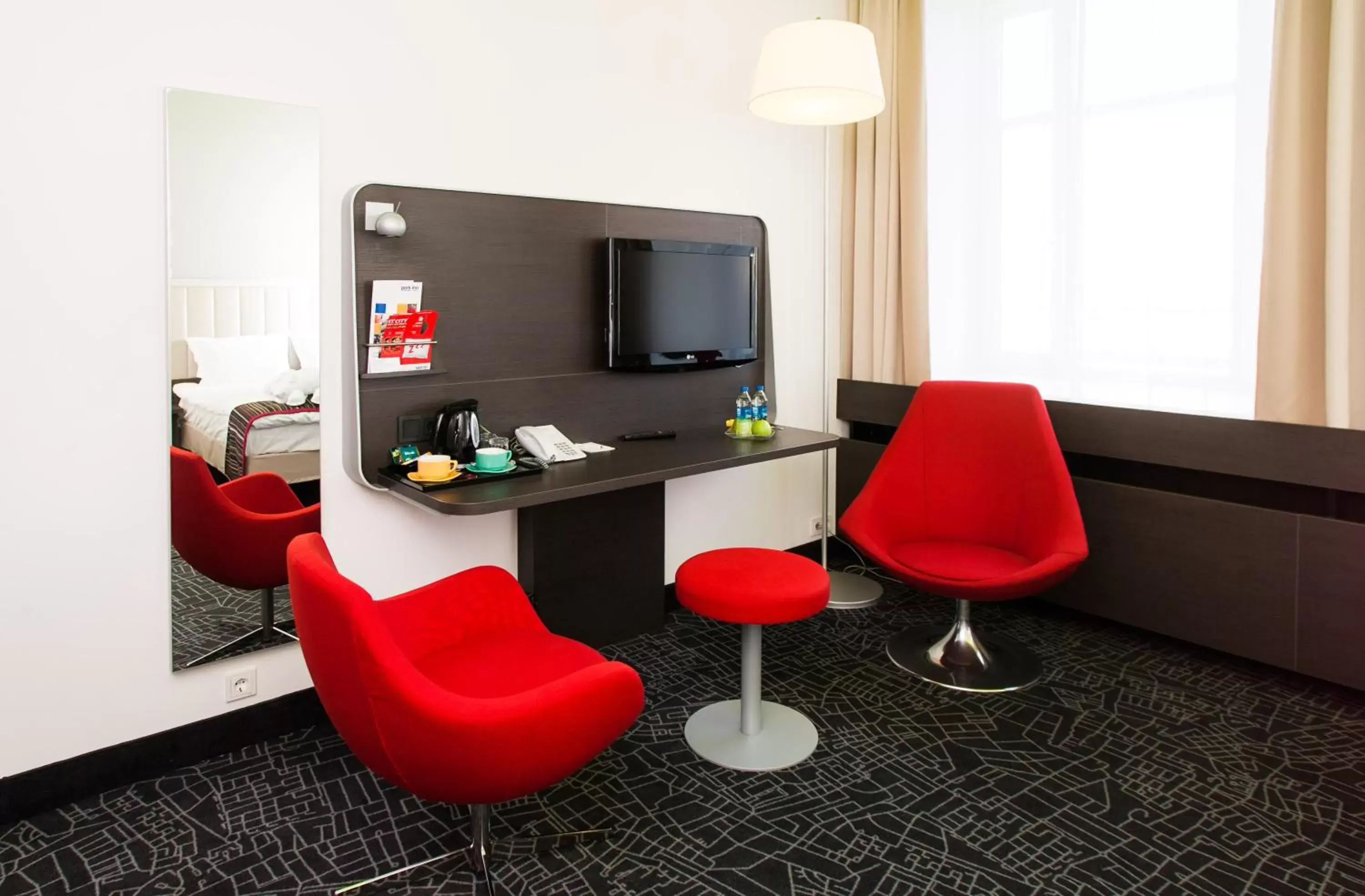 Communal lounge/ TV room, TV/Entertainment Center in Park Inn by Radisson Central Tallinn