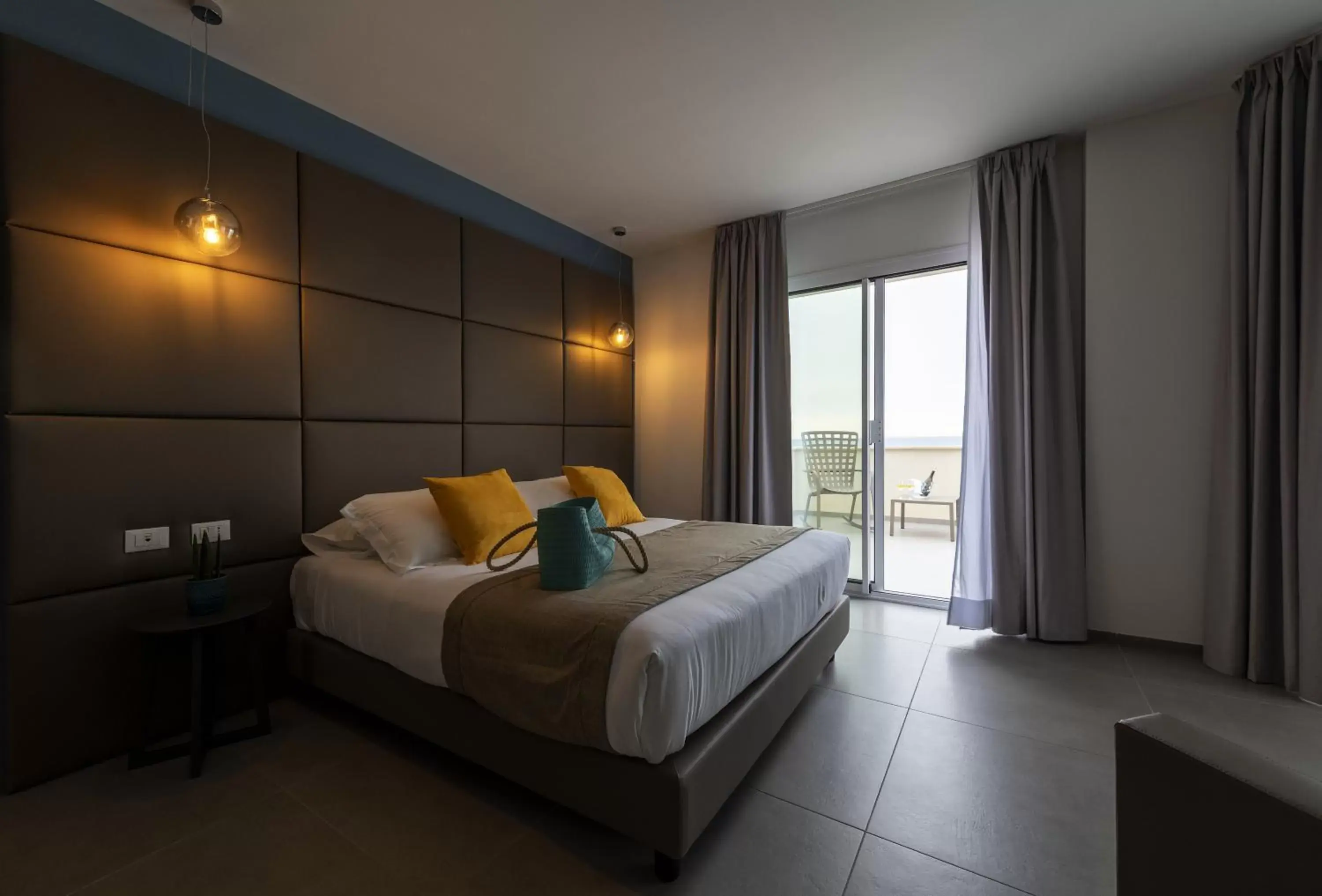 Bed in Resort La Battigia Beach & Spa