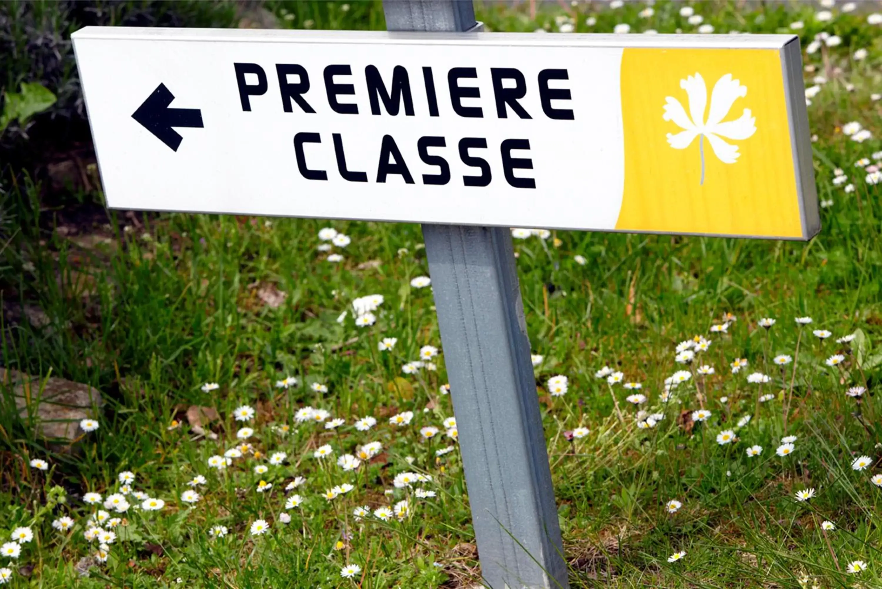 Property logo or sign in Premiere Classe Valenciennes Ouest Petite Foret