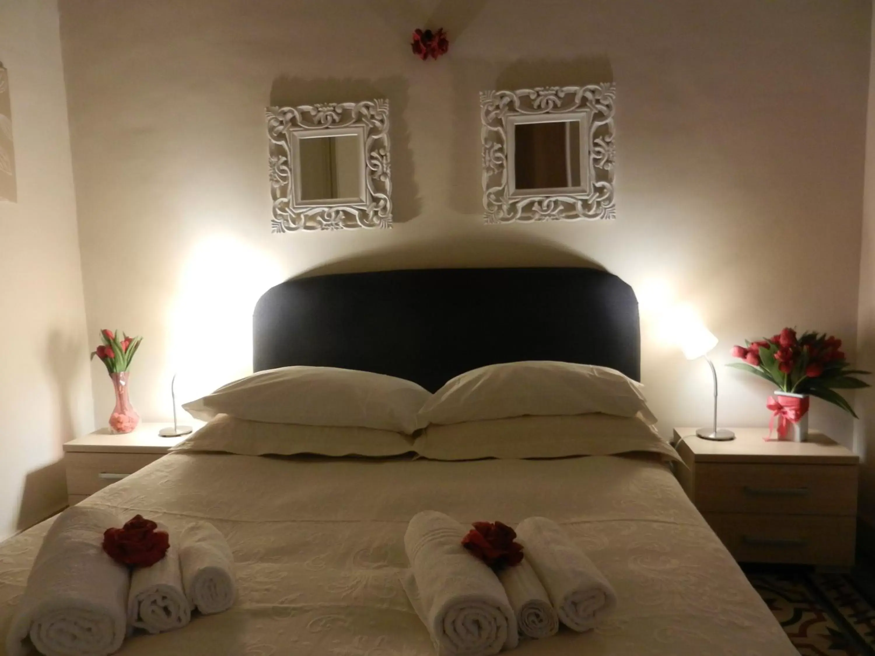 Bed in RossoCorallo B&B