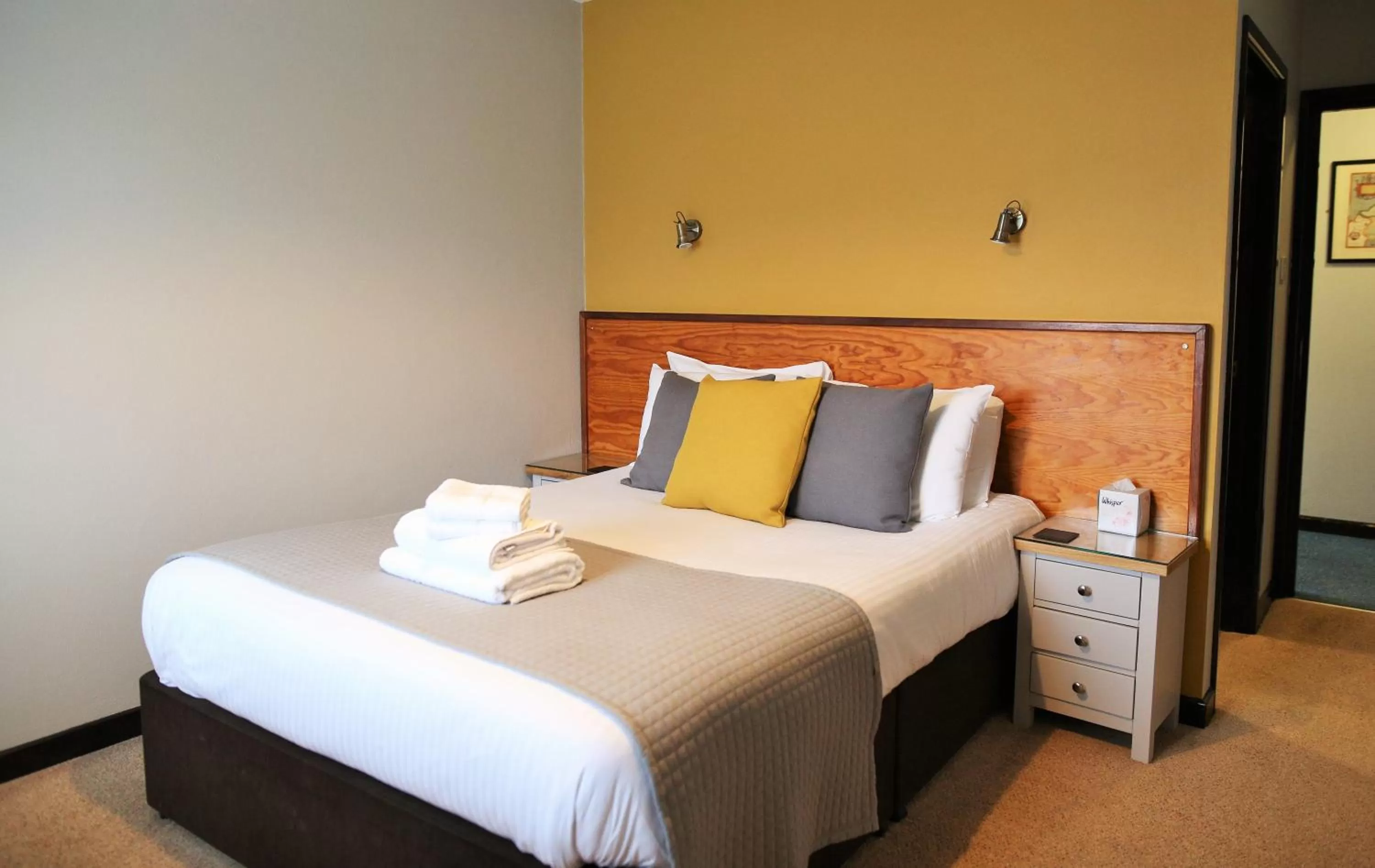 Bed in Tricky's Hotel