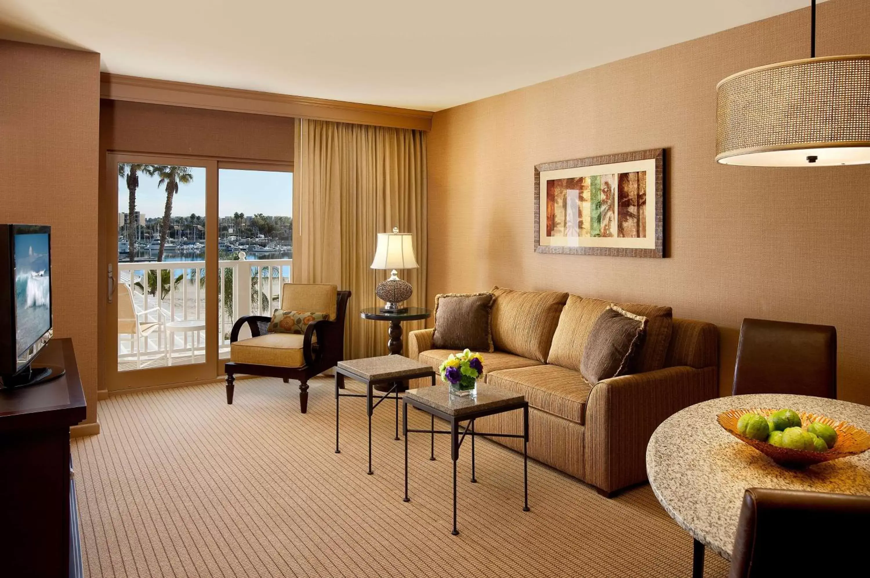 Living room, Seating Area in Jamaica Bay Inn Marina Del Rey Tapestry Collection by Hilton