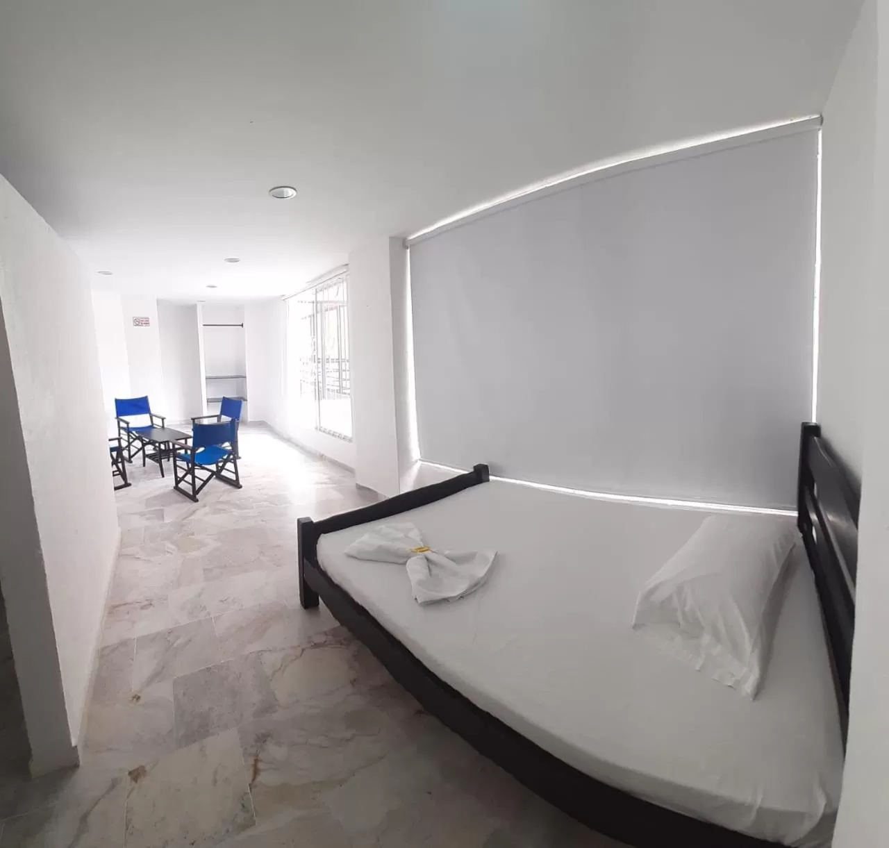 Bed in Blue Star Hotel