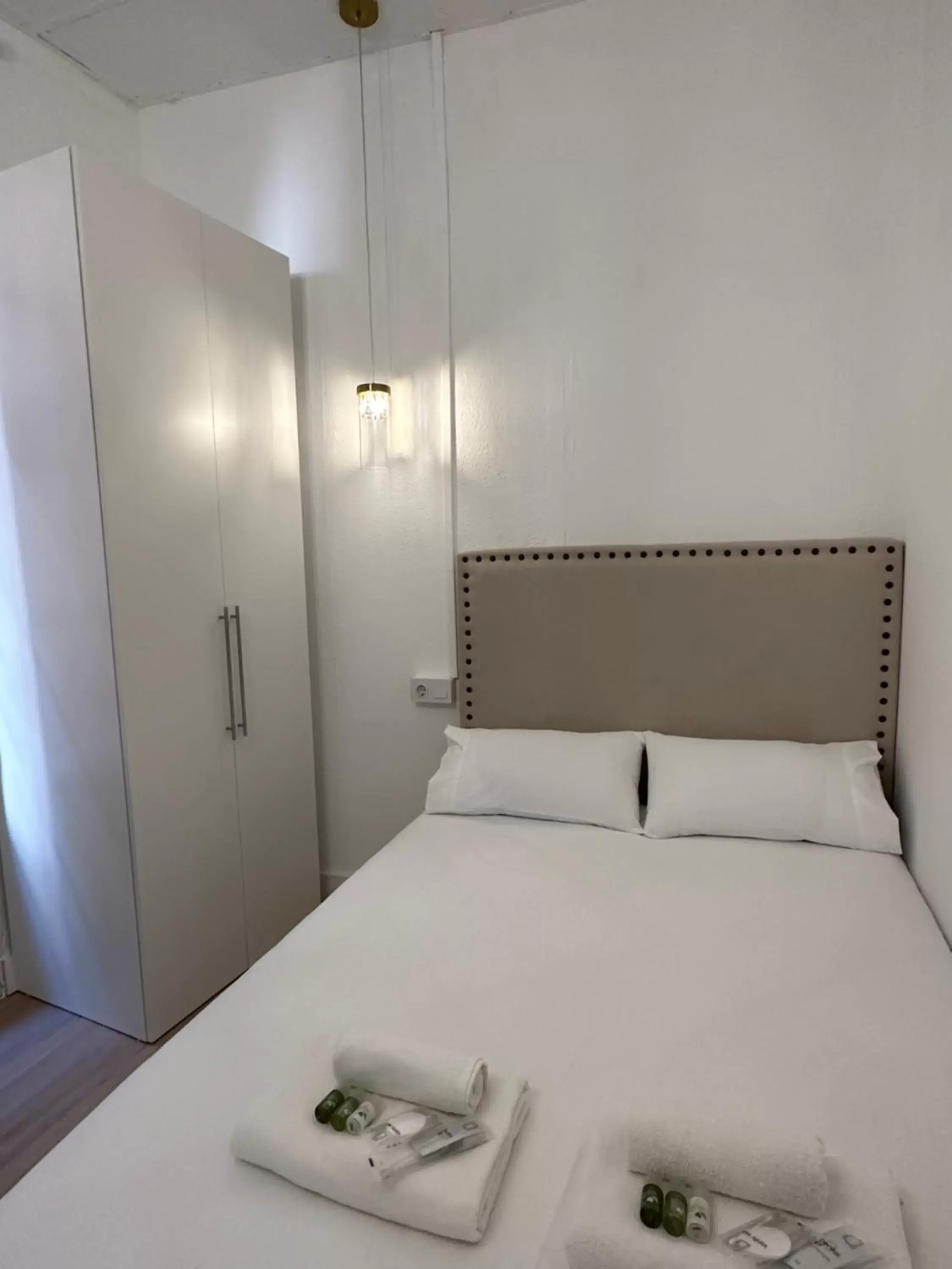 Bed in Siboni Luxury Rooms - Adults Only