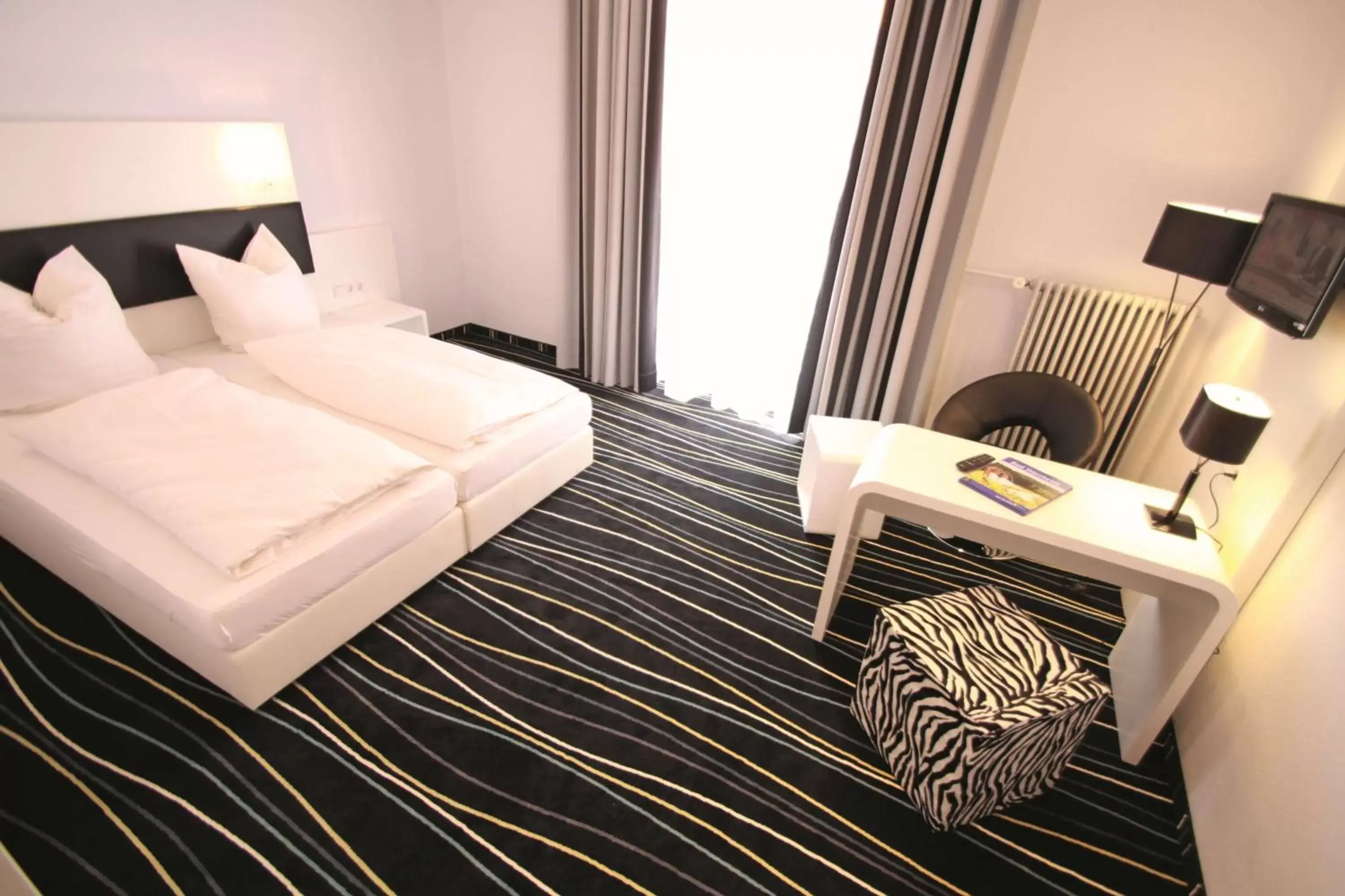 Photo of the whole room, Bed in Sure Hotel by Best Western Bad Dürrheim