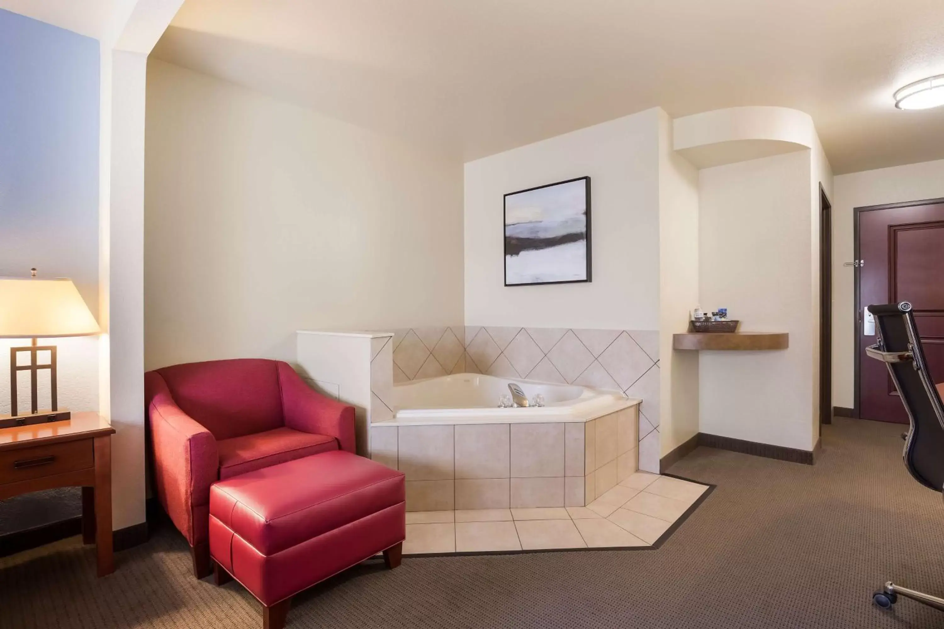 Bedroom, Seating Area in Best Western Coffeyville Central Business District Inn and Suites