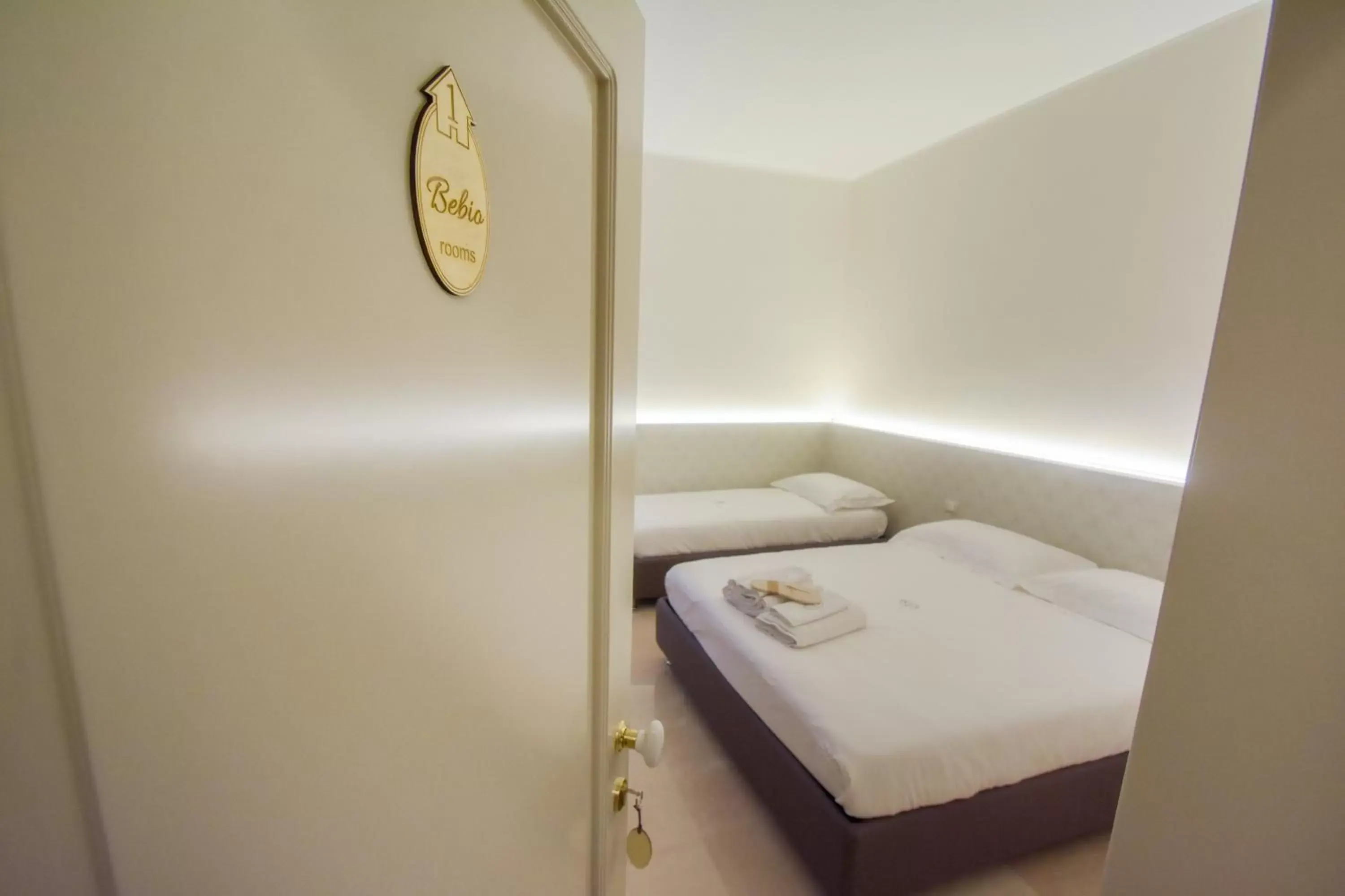 Bed in Bebio Rooms