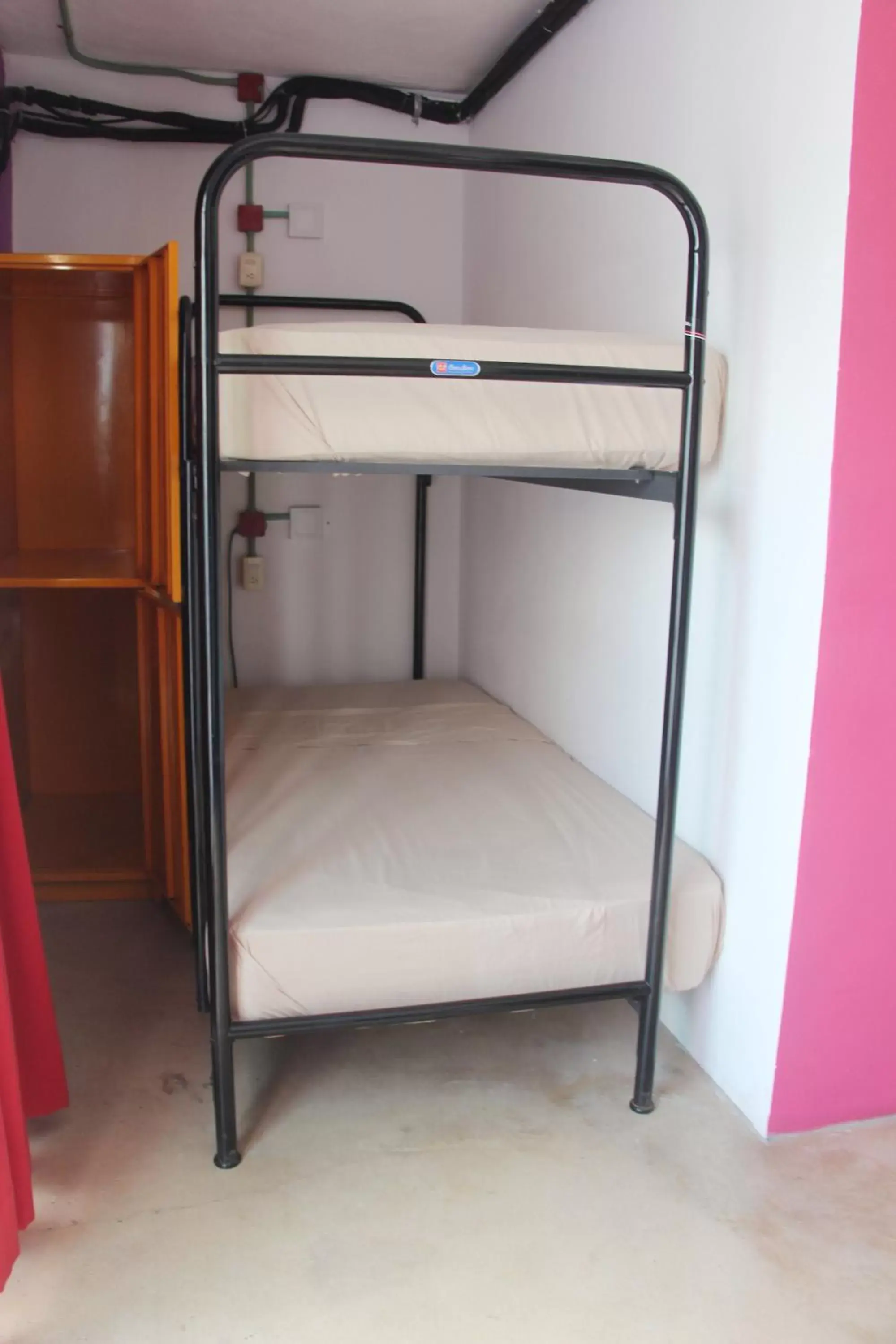 Photo of the whole room, Bunk Bed in Hotel & Hostal Casa de Luz Cancun