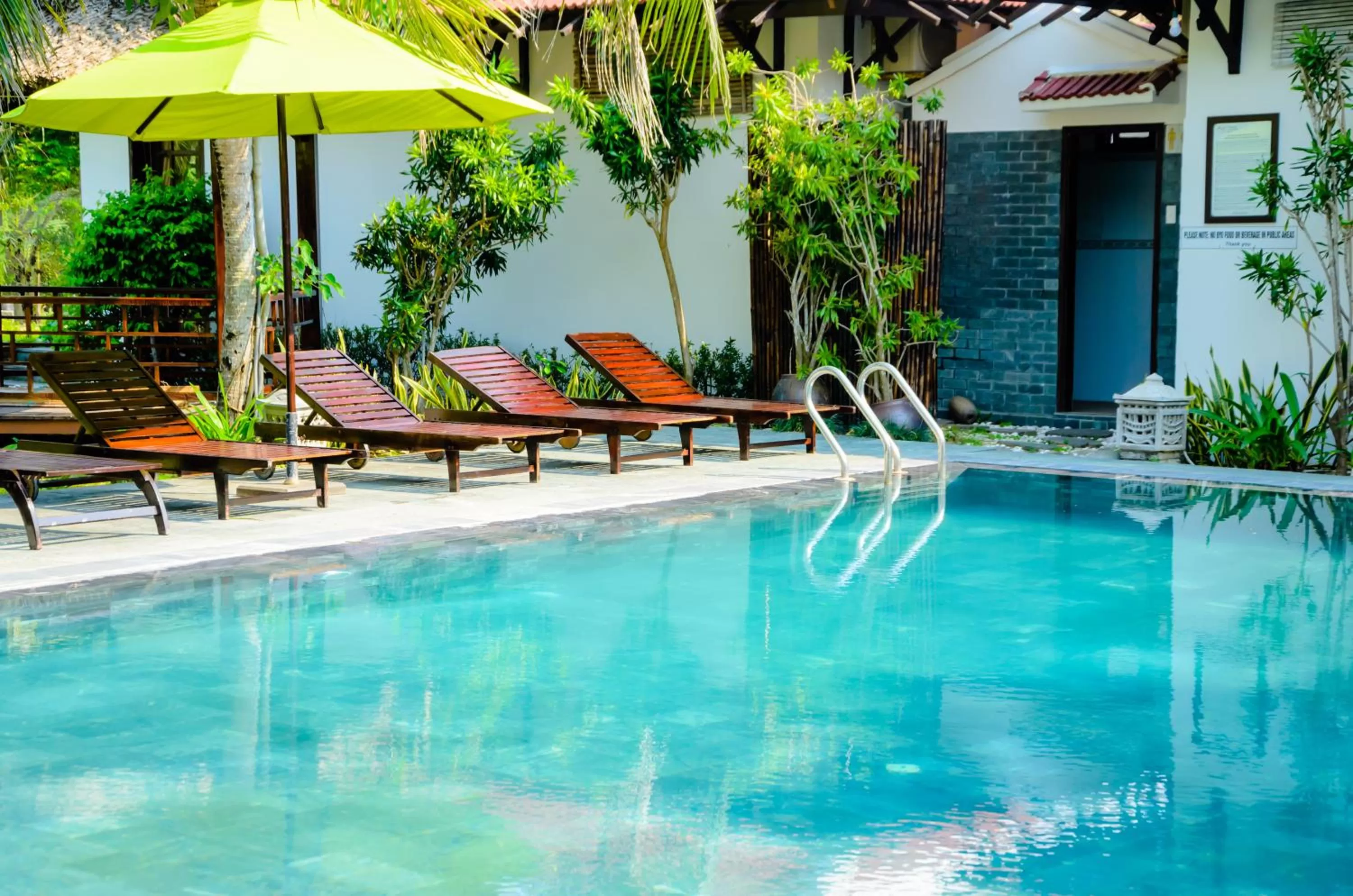 Swimming pool in Riverside Bamboo Resort Hoi An
