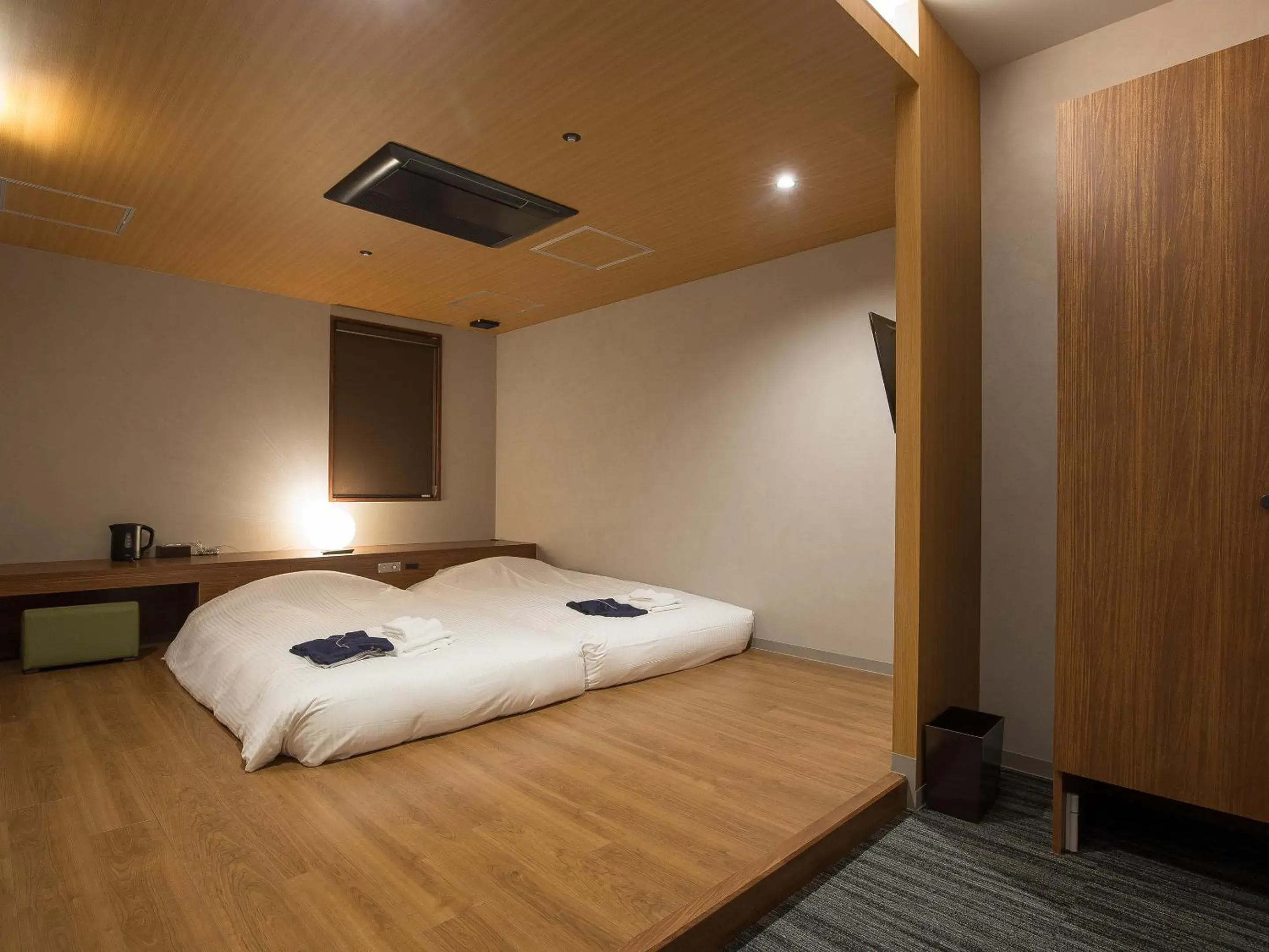 Bed in Gardens Cabin Bed in Gardens Cabin