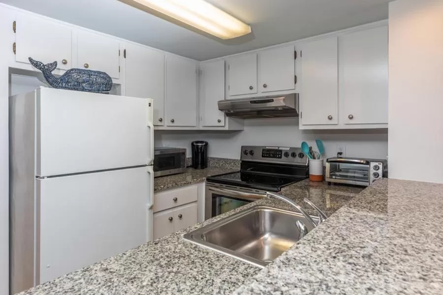 Kitchen/Kitchenette in Wild Dunes Resort - Vacation Rentals