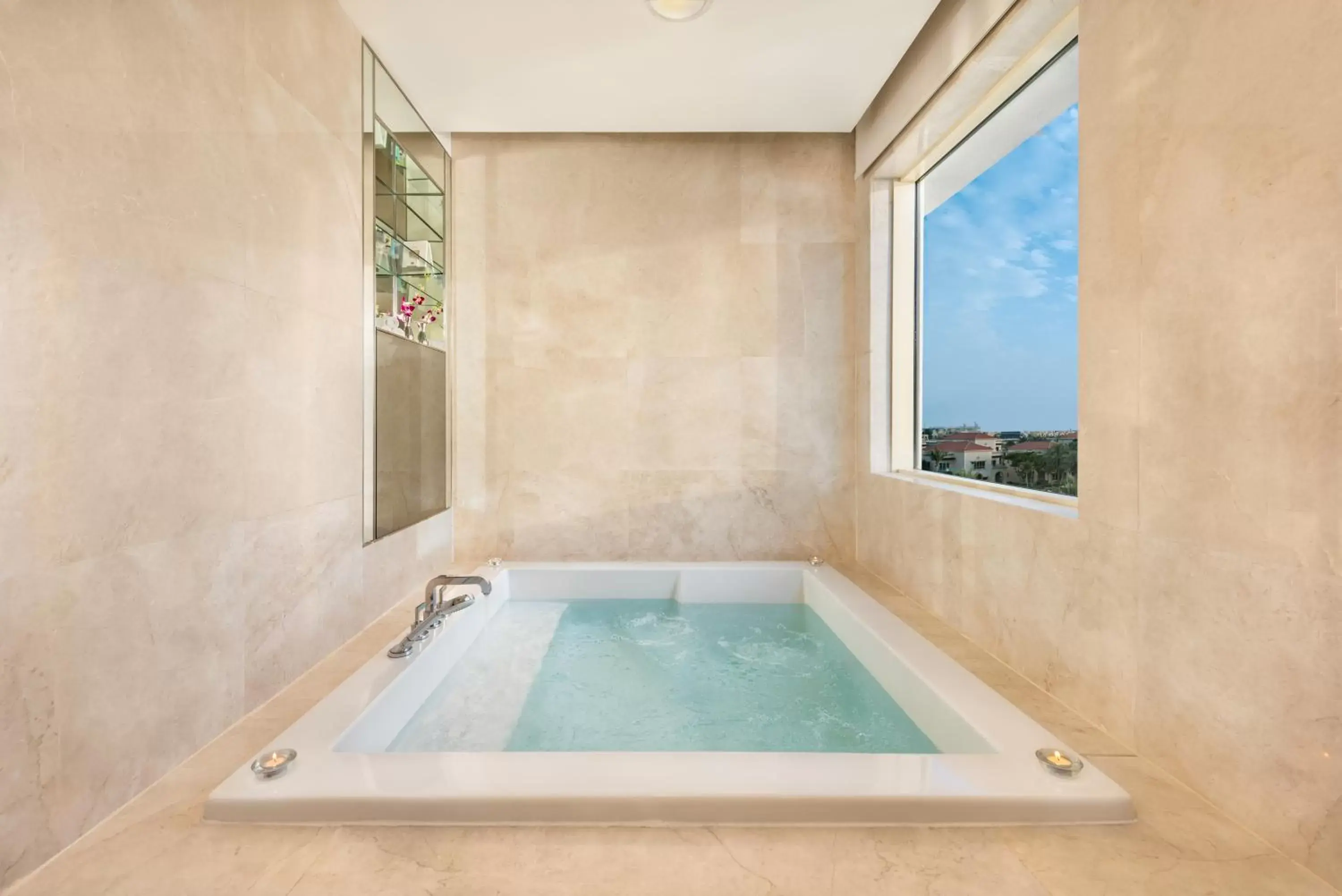 Bathroom, Swimming Pool in Al Raha Beach Hotel