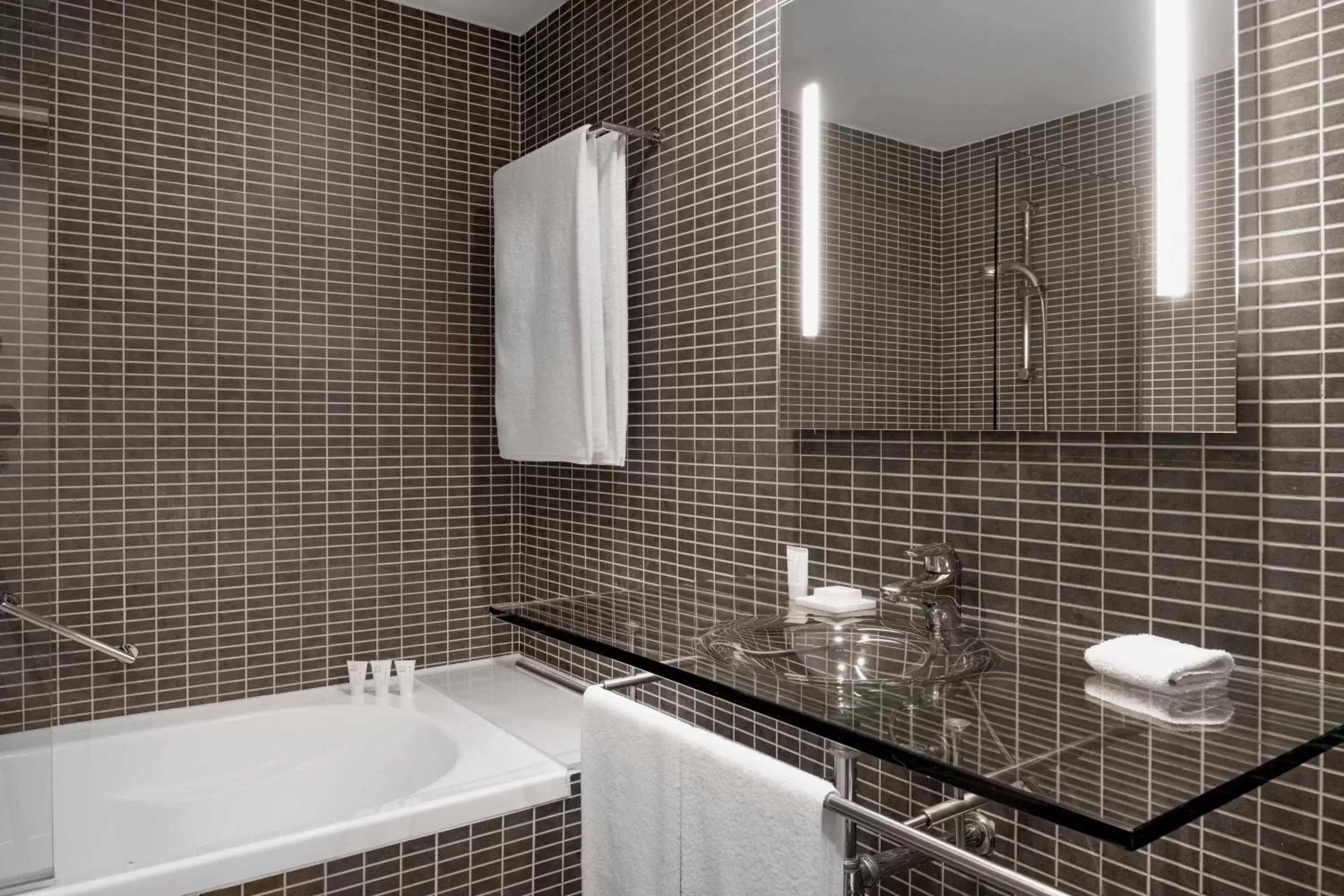 Bathroom in AC Hotel Gavà Mar Airport by Marriott