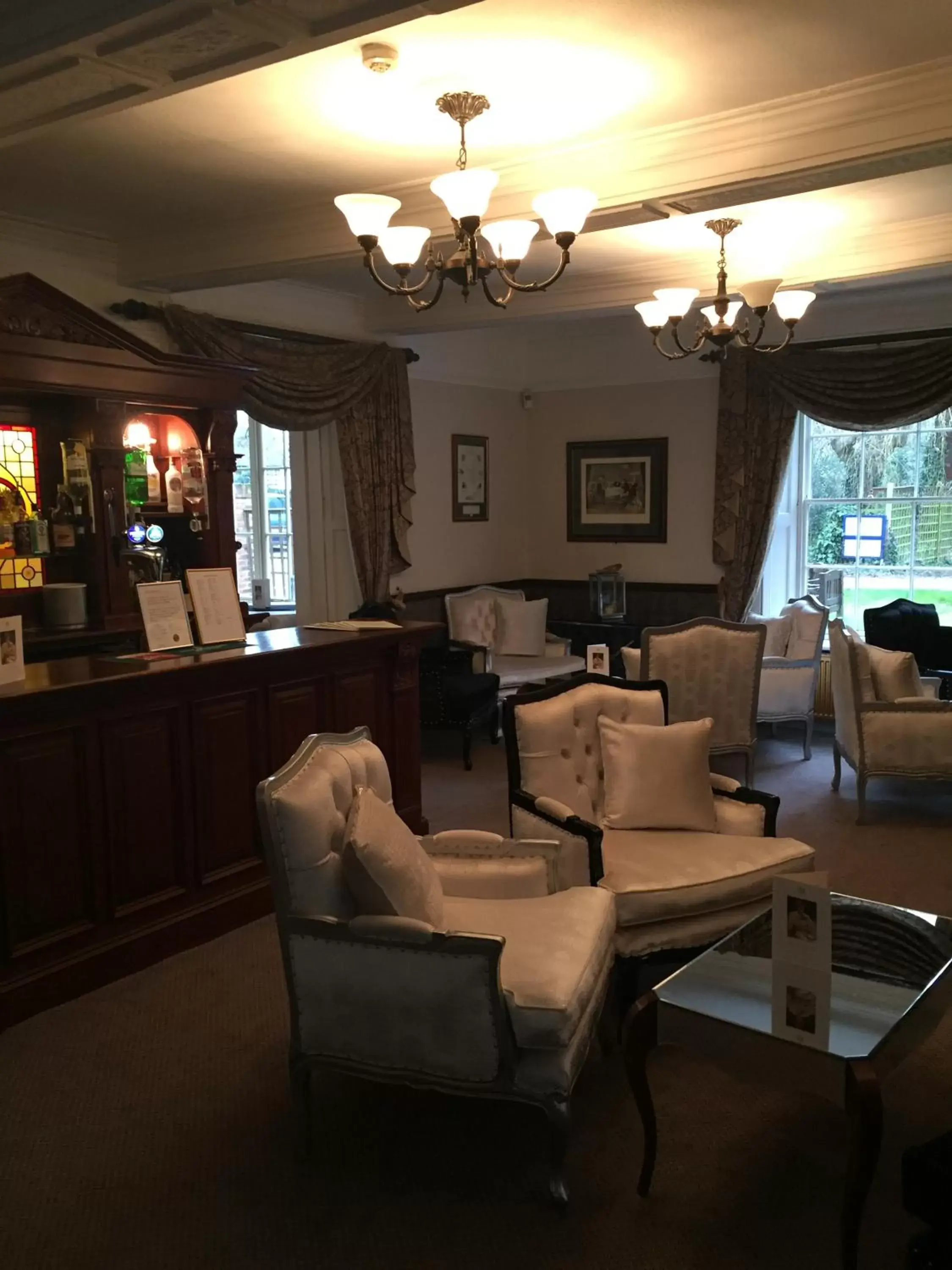Communal lounge/ TV room, Lobby/Reception in Risley Hall Hotel