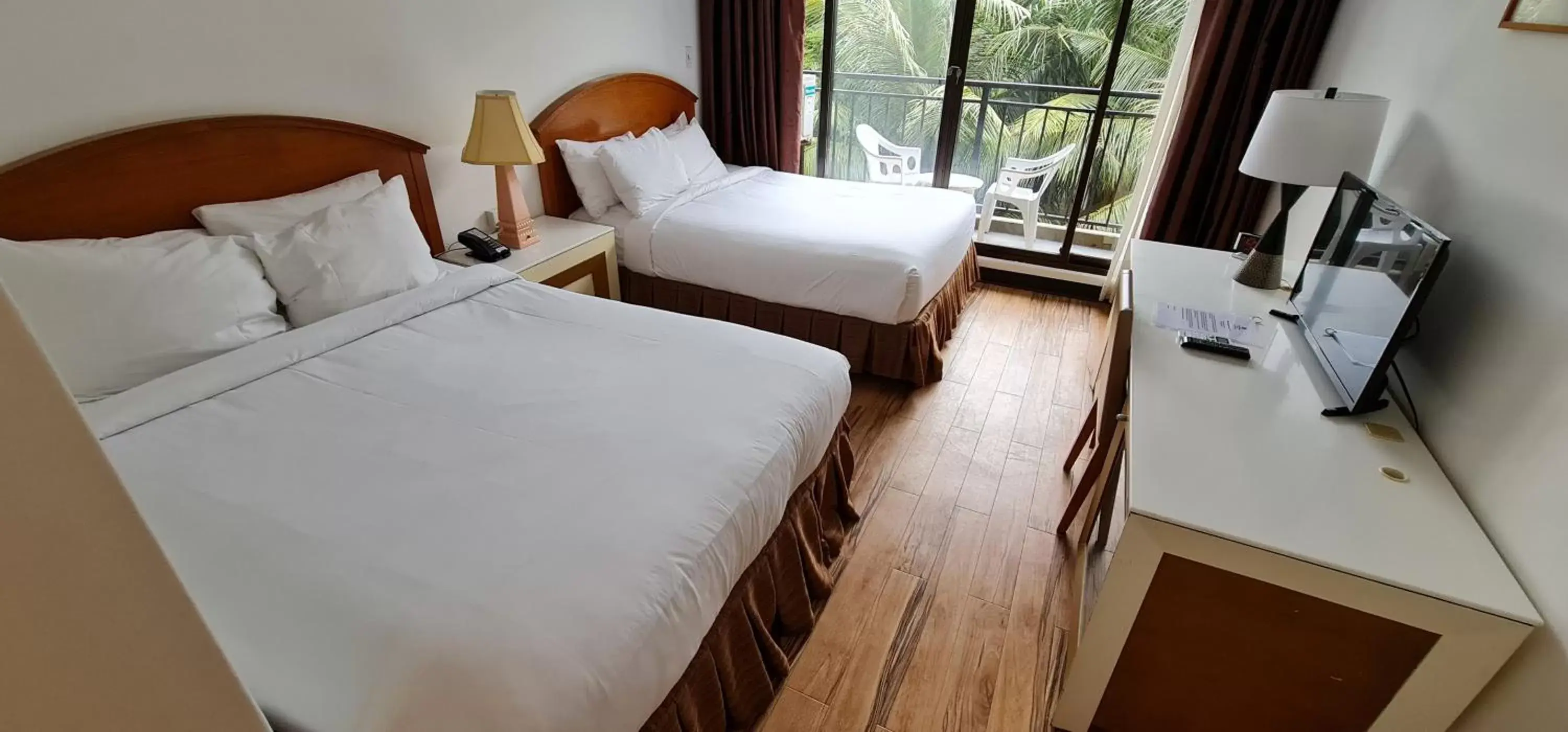 Bed in SureStay Hotel by Best Western Guam Palmridge