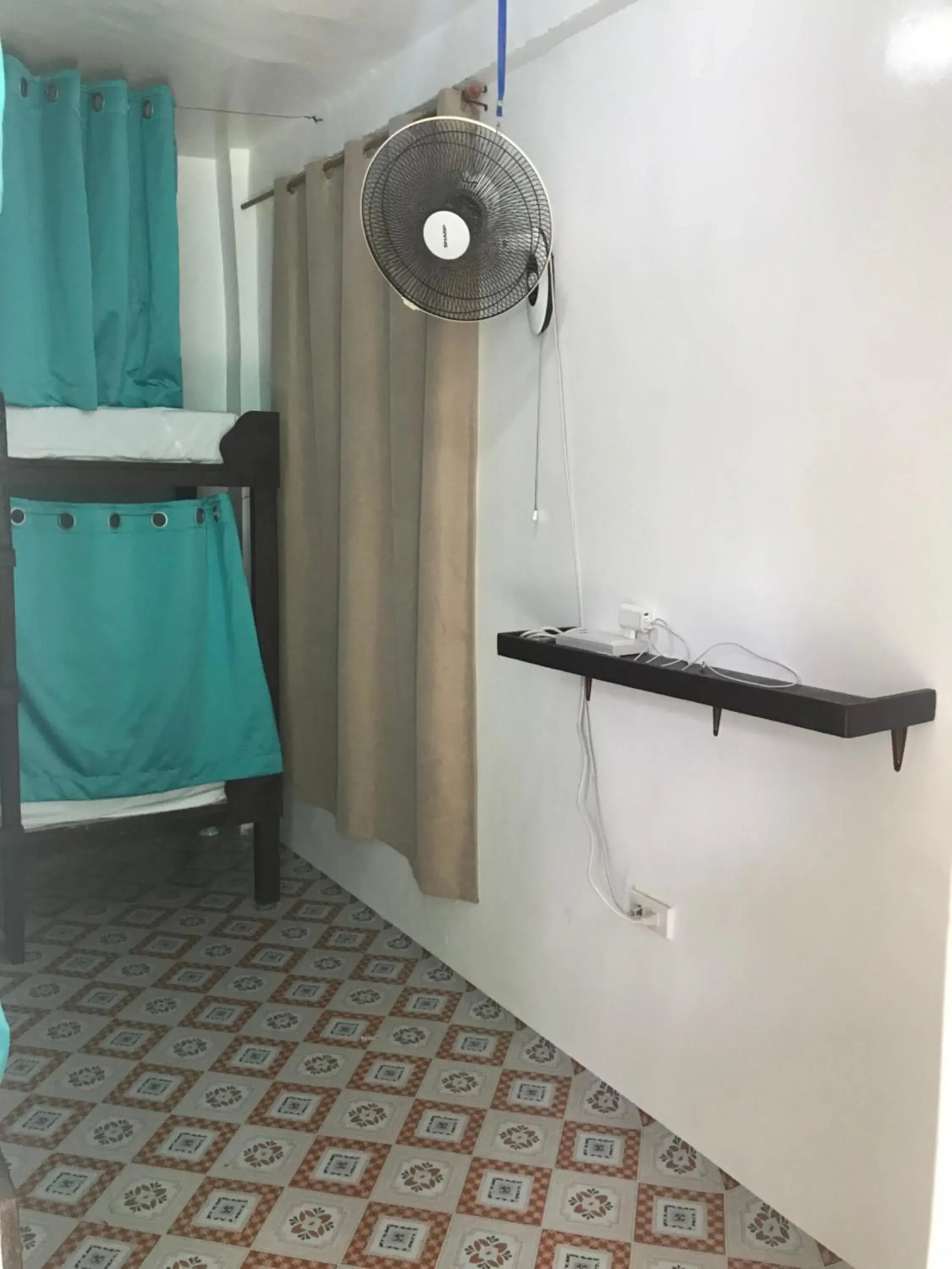 Photo of the whole room, Bathroom in Malapascua Budget Inn