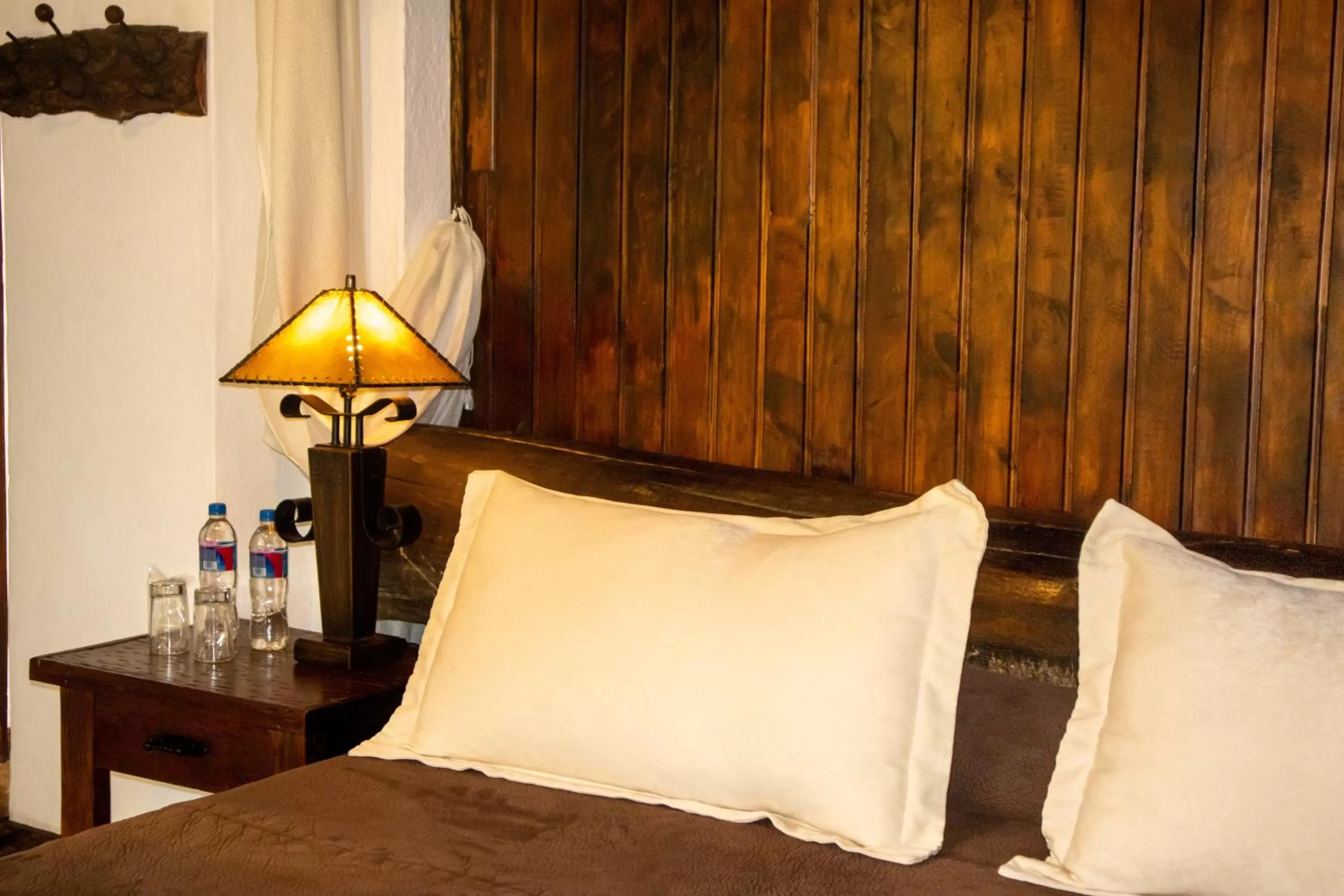 Bed in Hacienda Hostería Dos Chorreras