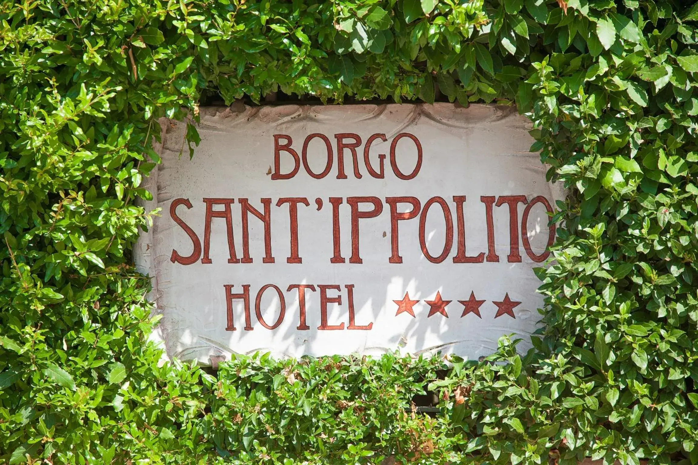 Property logo or sign in Borgo Sant'ippolito Country Hotel