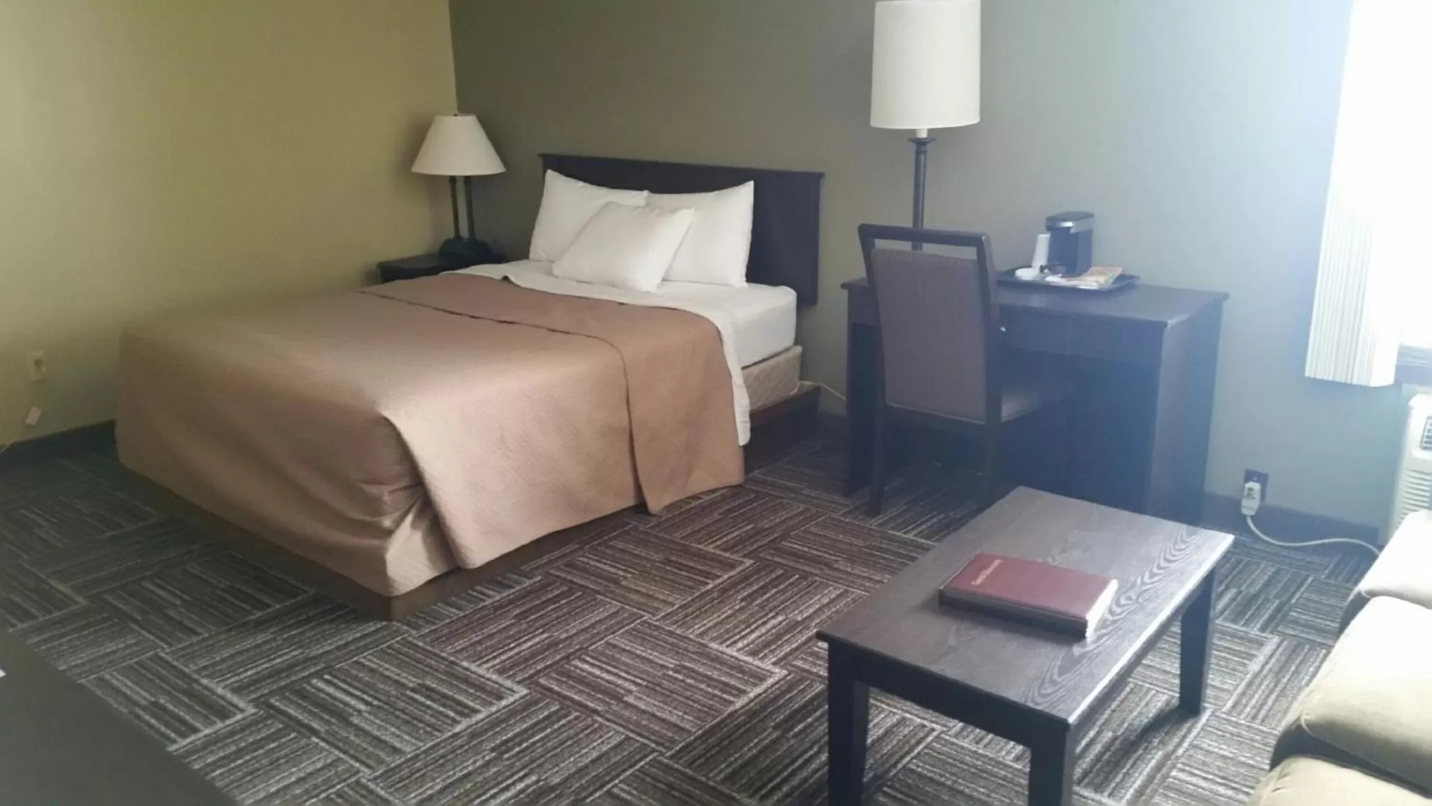 Bed in Sunlac Inn Devils Lake