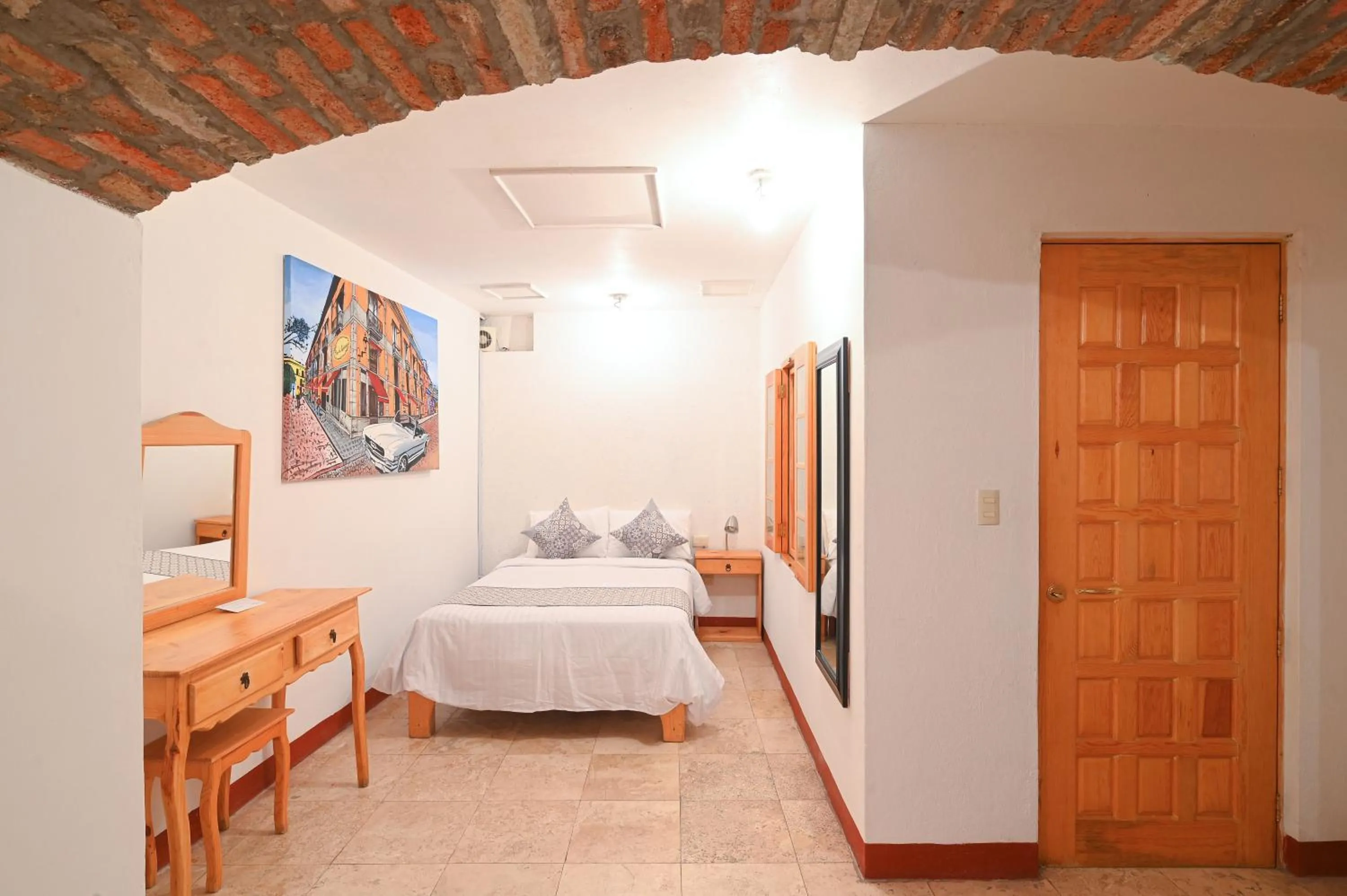 Bed in Hotel Meson Cuevano