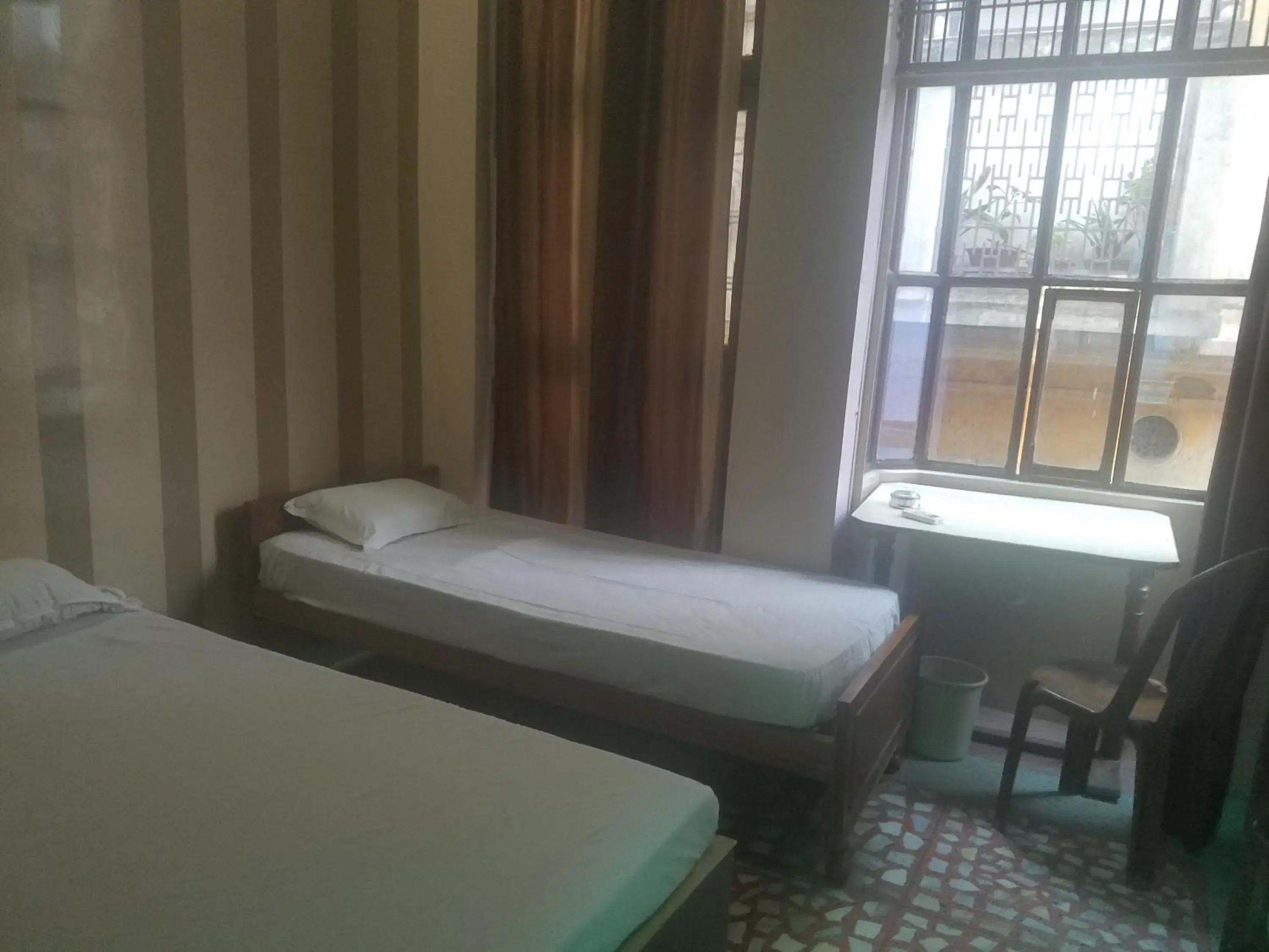 Photo of the whole room, Bed in Baba Guest House