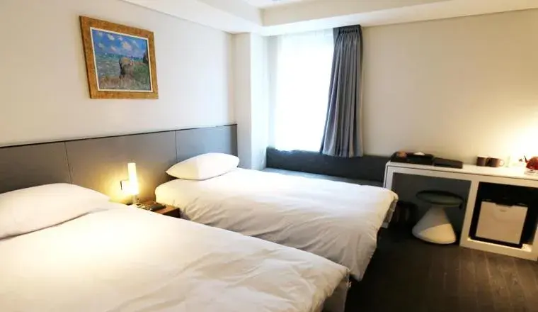 Bed in Hotel Thomas Myeongdong