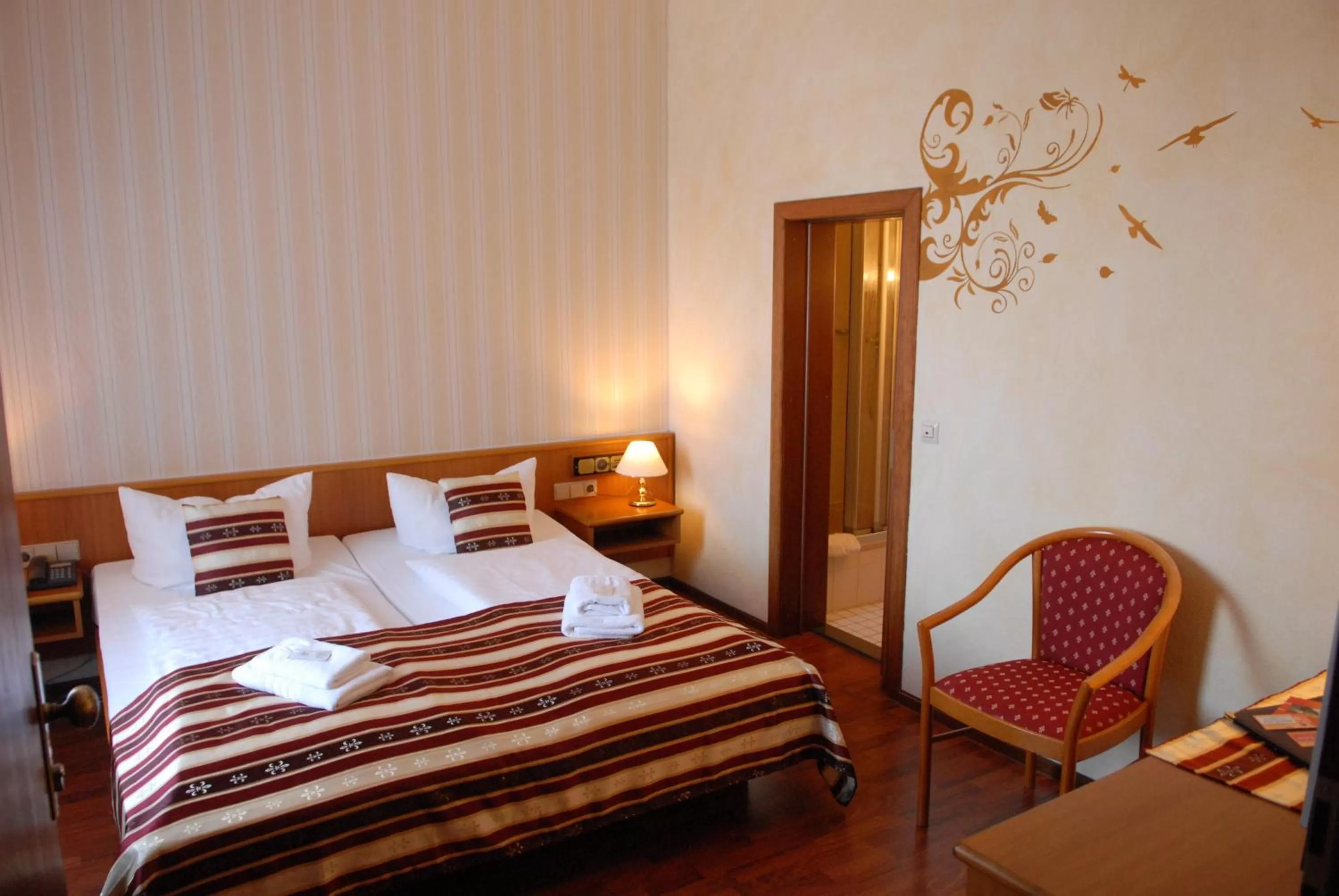 Photo of the whole room, Bed in Hotel Schwarzer Bär