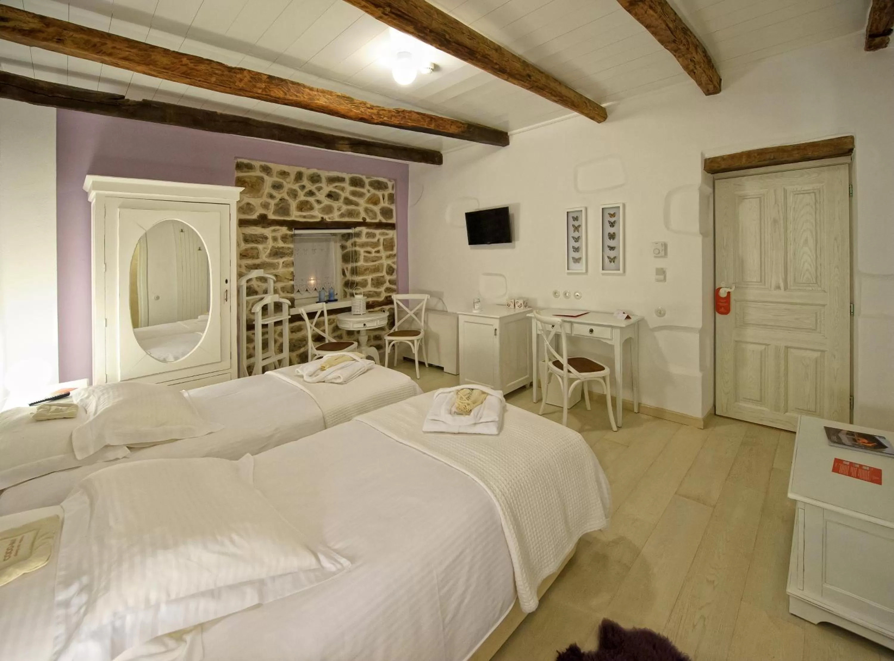 Bed in Orologopoulos Mansion Luxury Hotel