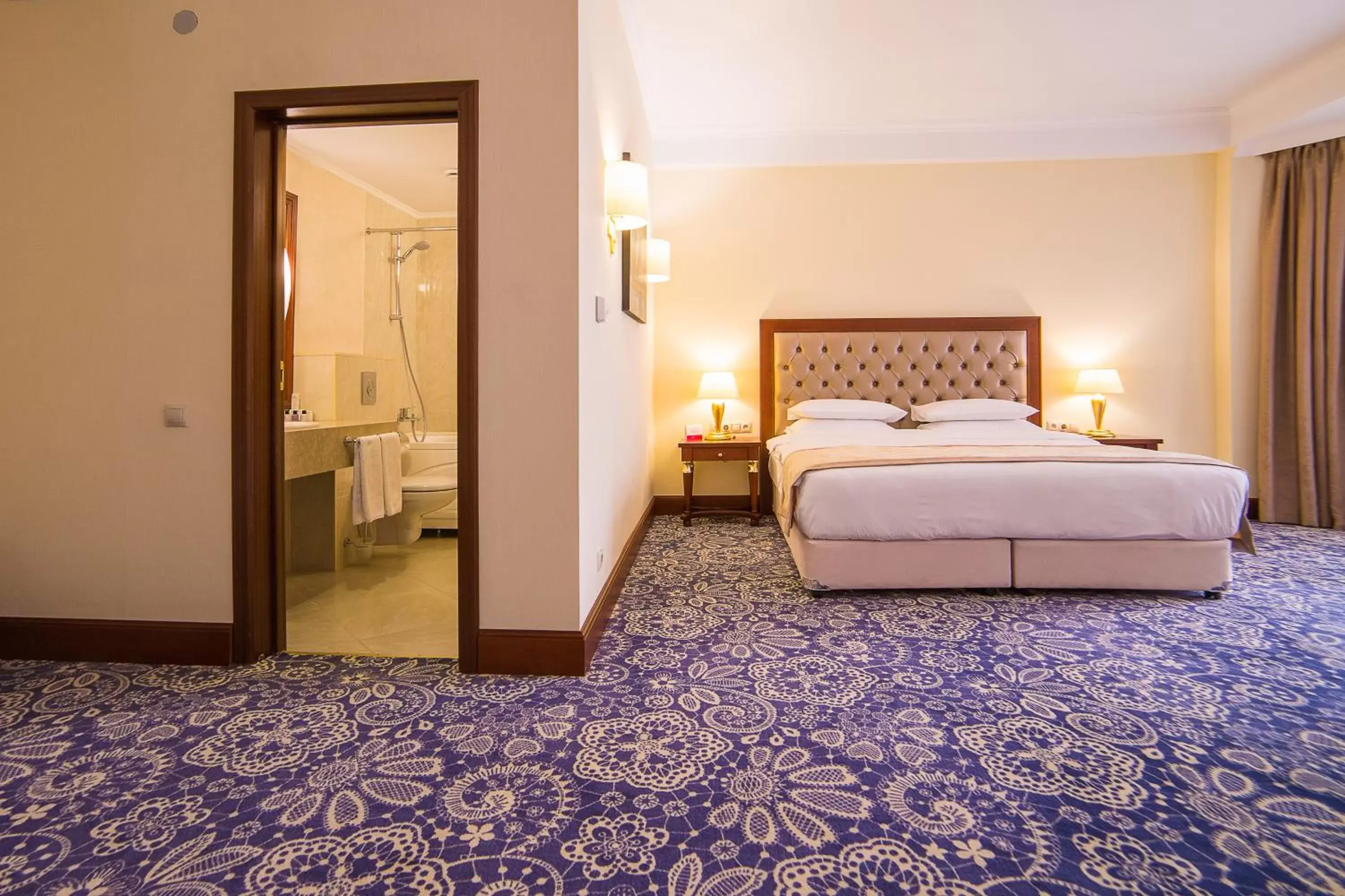 Photo of the whole room, Bed in Ramada by Wyndham Almaty Photo of the whole room, Bed in Ramada by Wyndham Almaty