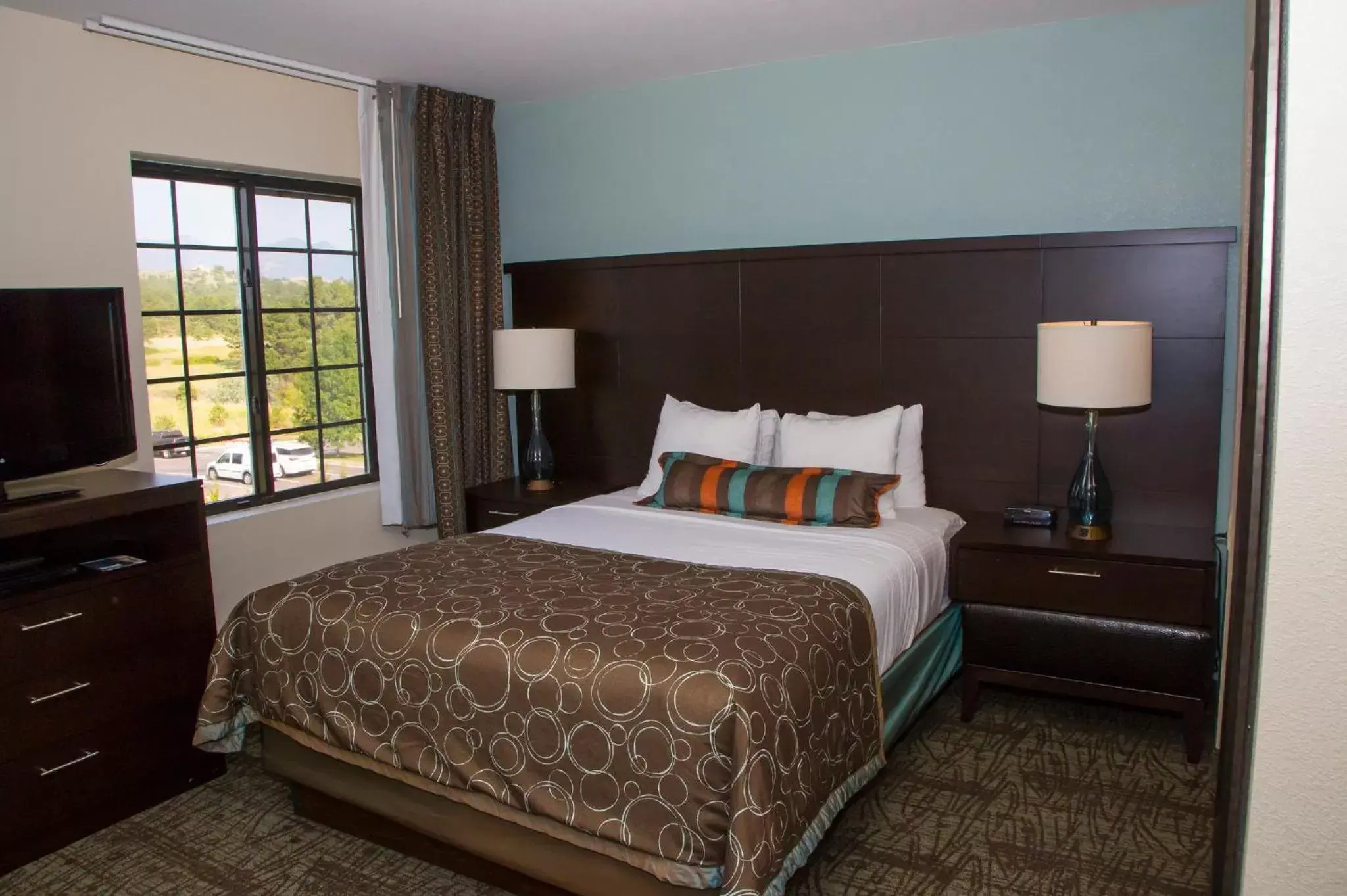 Photo of the whole room, Bed in Staybridge Suites Colorado Springs North, an IHG Hotel