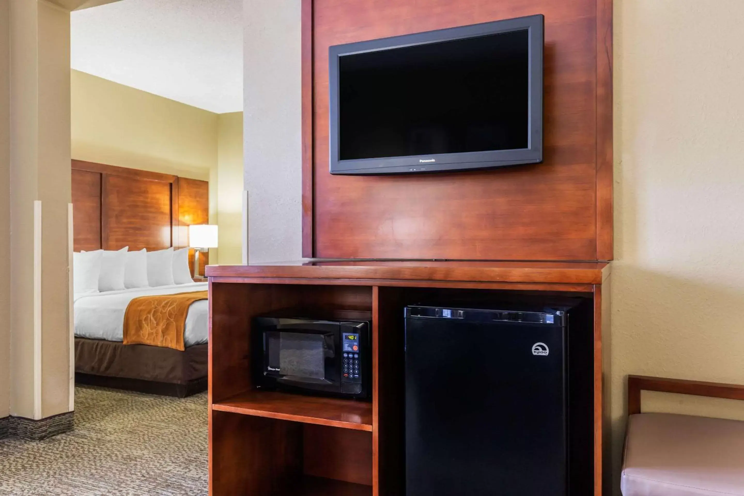Photo of the whole room, TV/Entertainment Center in Comfort Suites near I-80 and I-94
