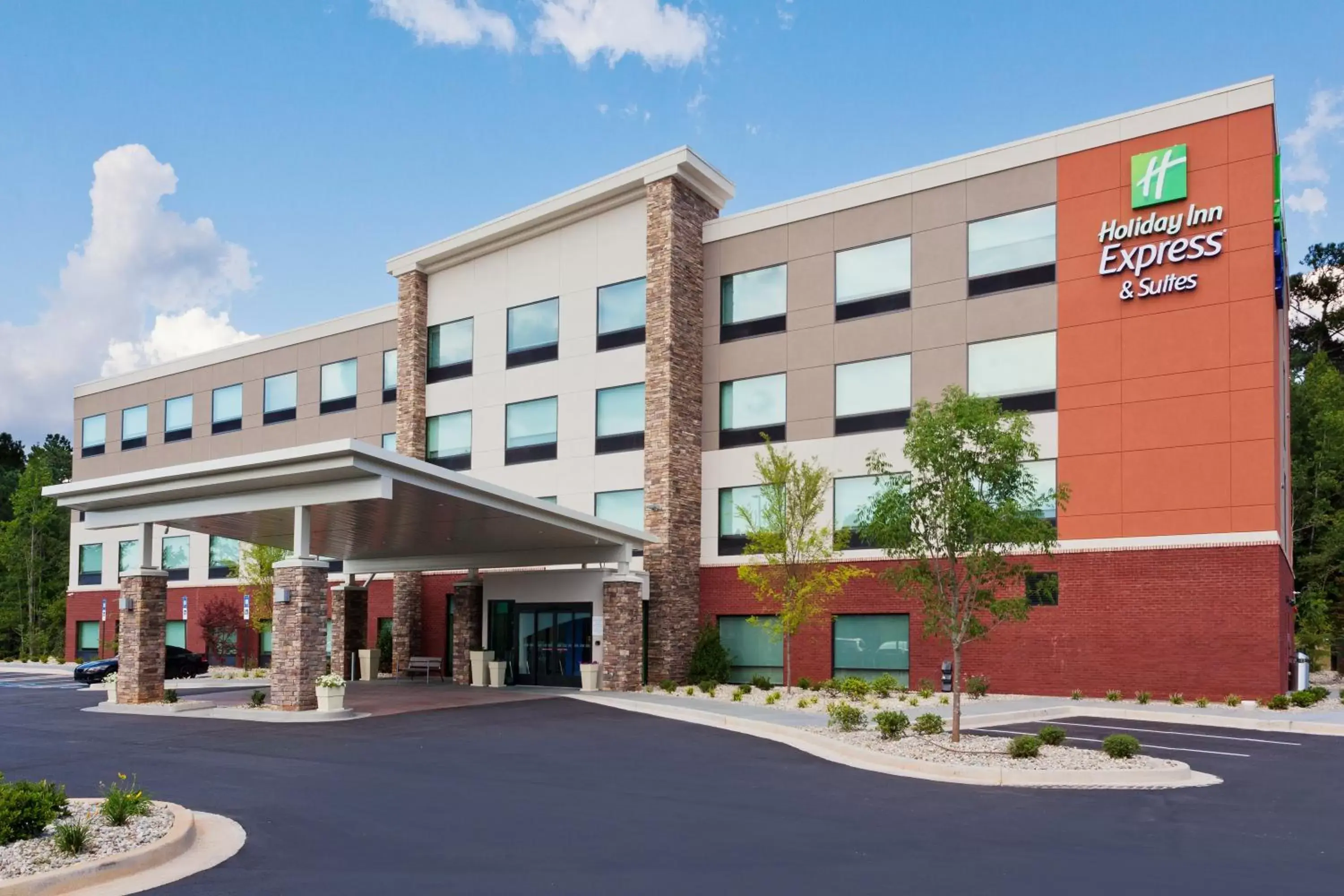 Property building in Holiday Inn Express & Suites - Fayetteville, an IHG Hotel