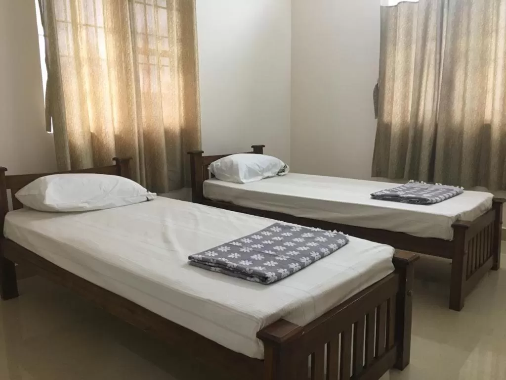 Bedroom, Bed in Shantham Service Apartments