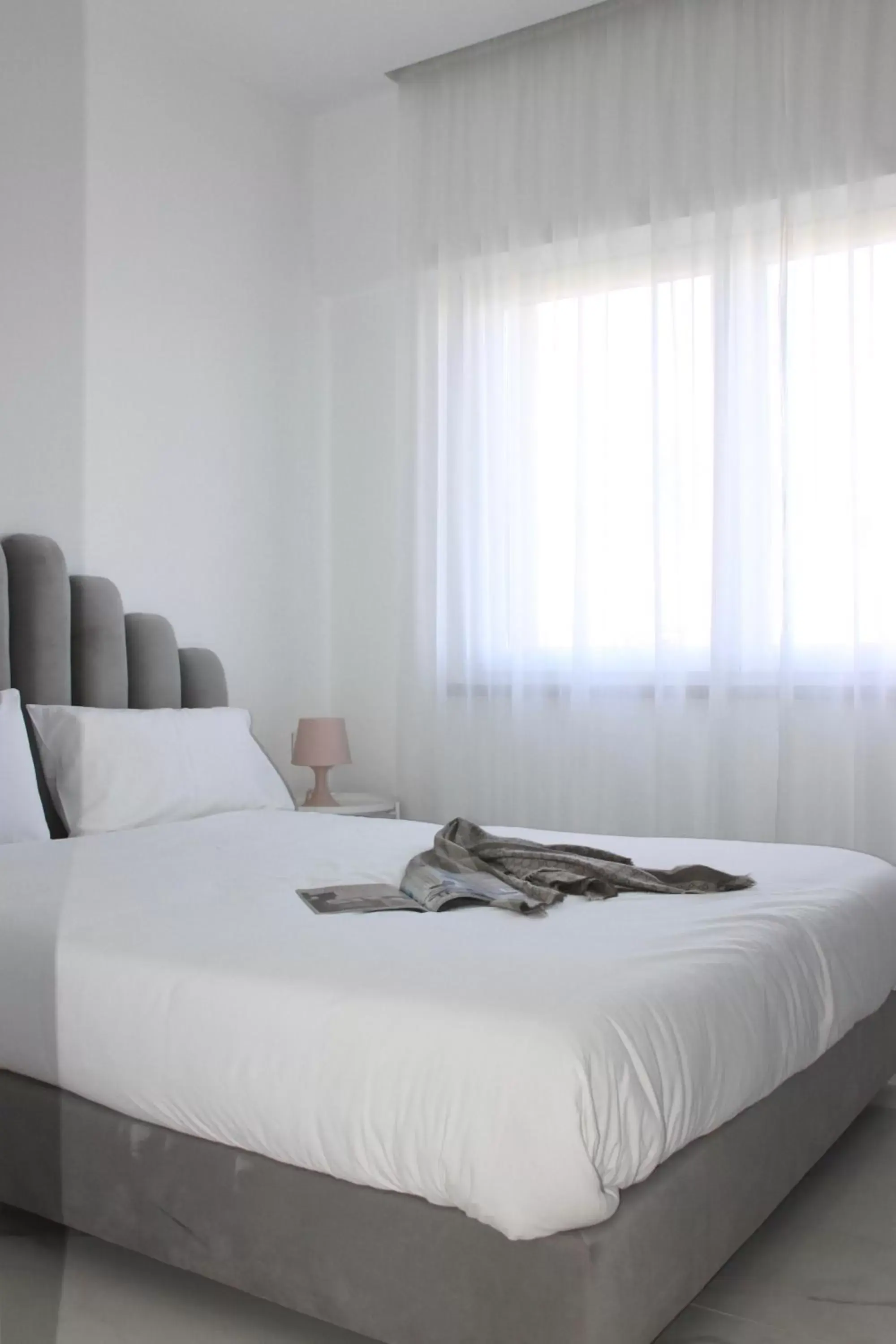 Bed in S'O Suites Tropea