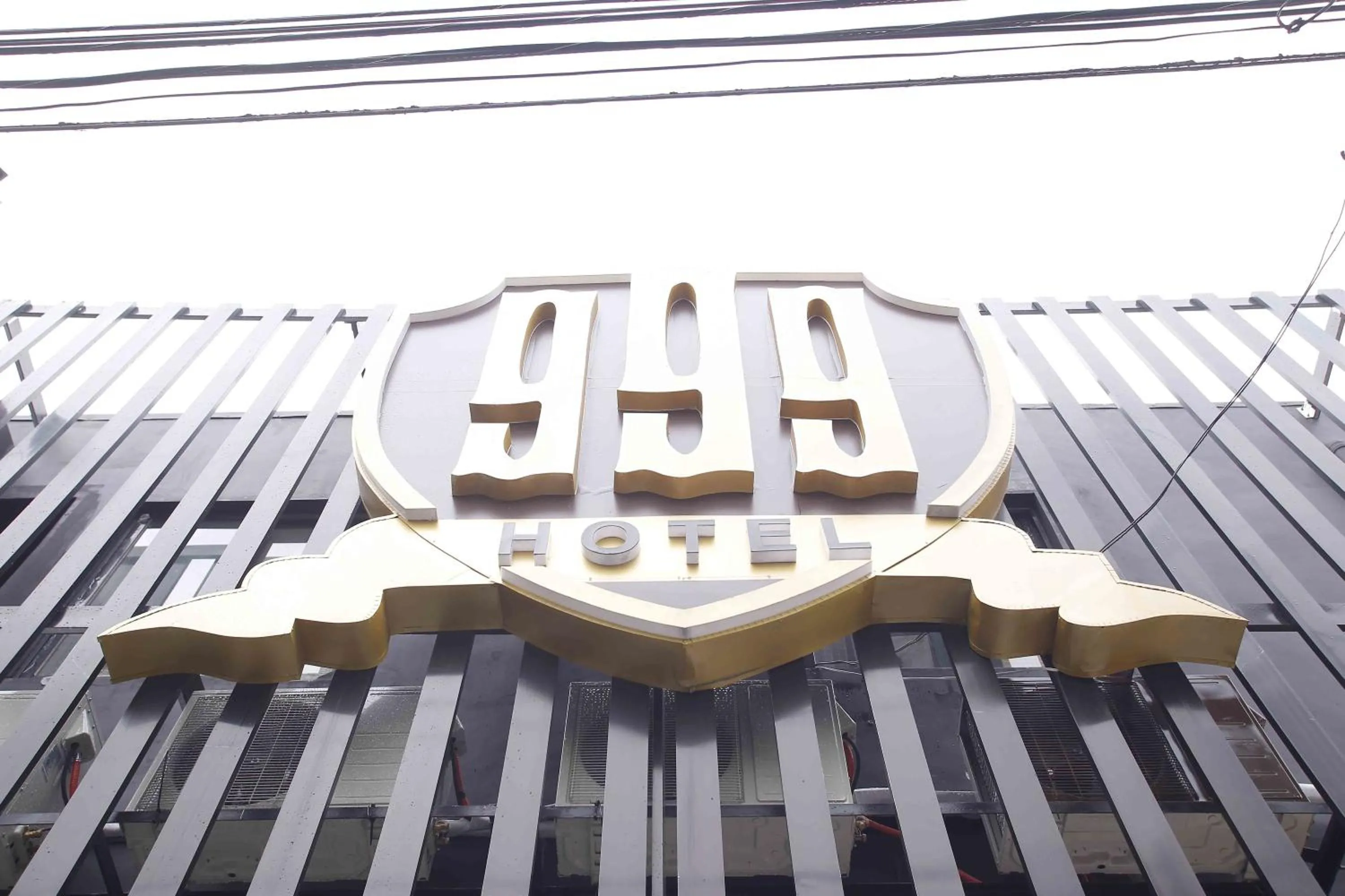 Property logo or sign in 999 Hotel