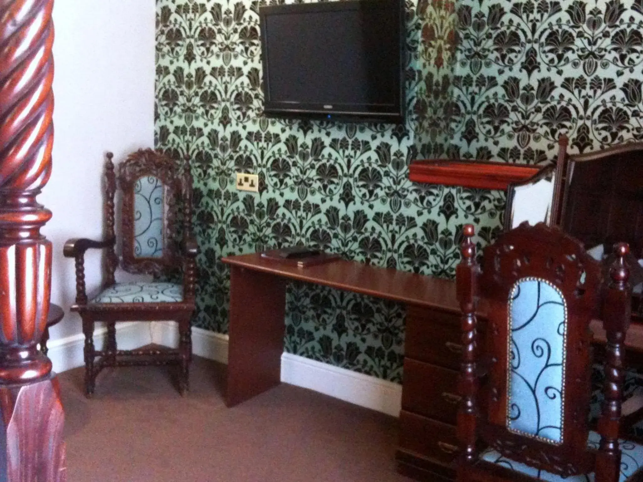 Decorative detail, TV/Entertainment Center in Ely House Hotel